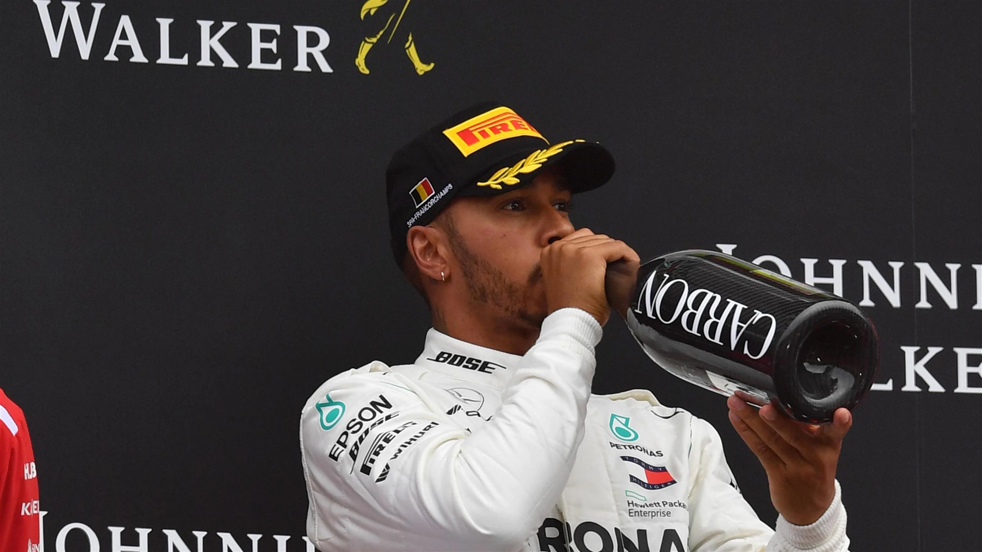 Lewis Hamilton, Mercedes AMG F1 celebrates with the champagne on the podium at Formula One World