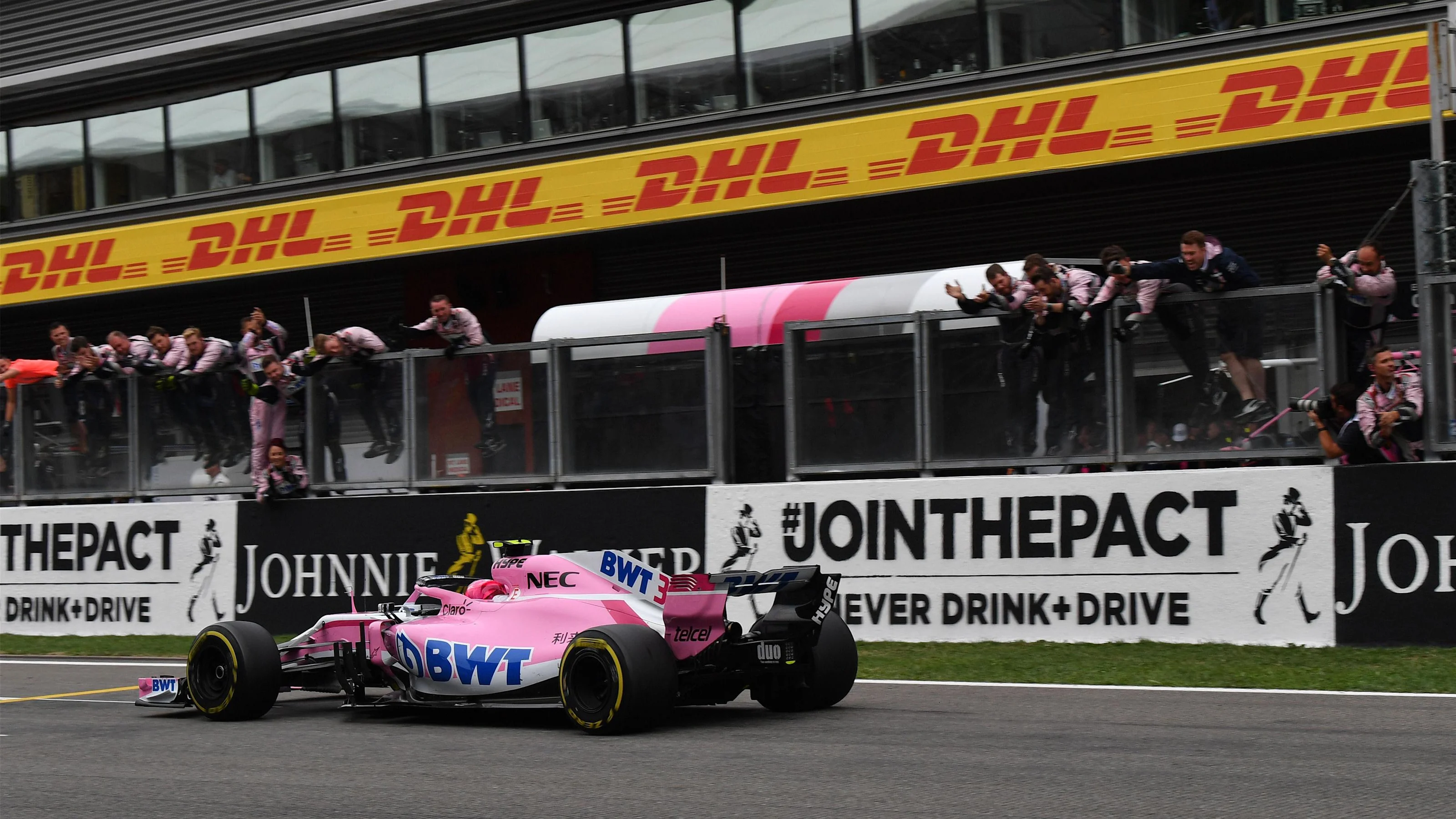 Esteban Ocon, Racing Point Force India VJM11 crosses the line at Formula One World Championship,