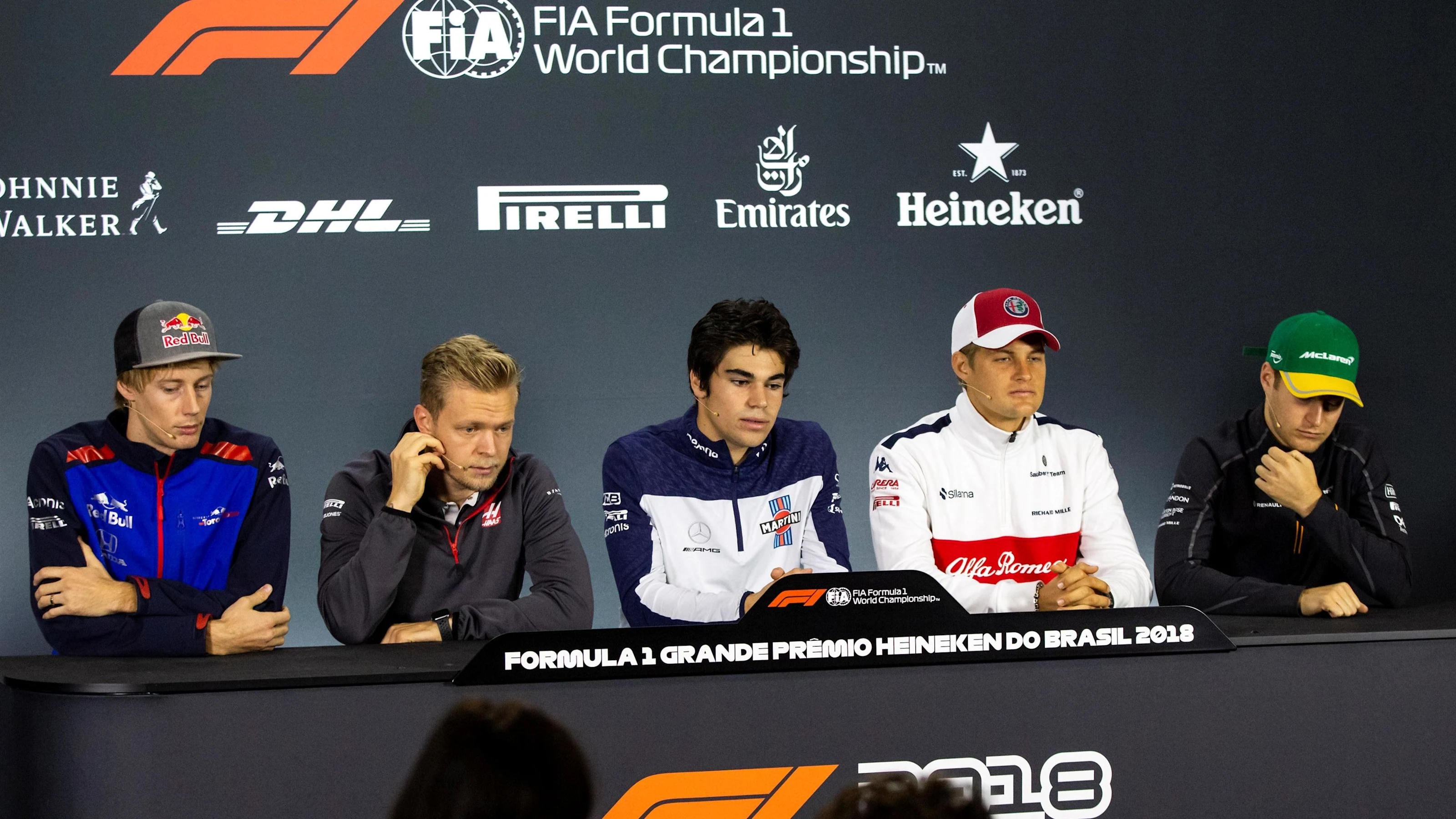 (L to R): Brendon Hartley, Scuderia Toro Rosso, Kevin Magnussen, Haas F1 Team, Lance Stroll,