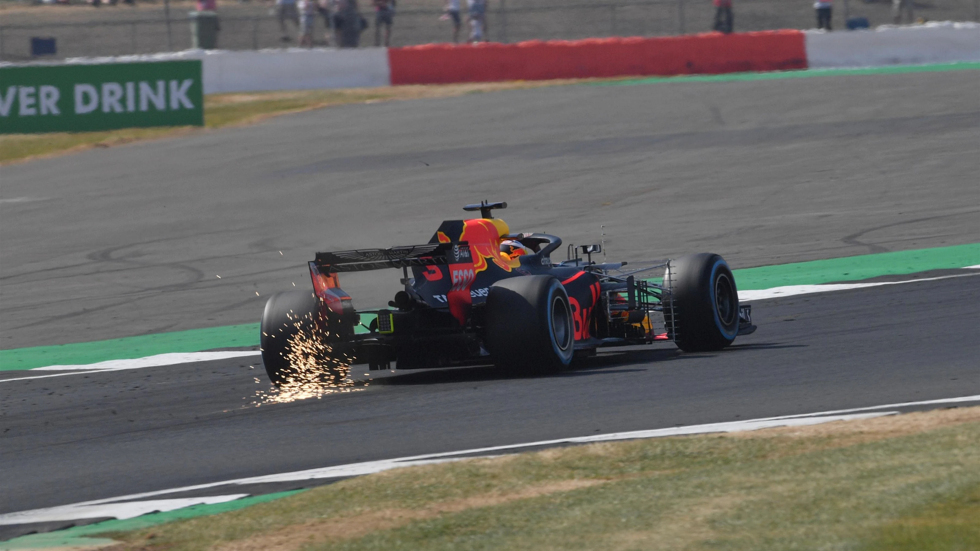 Daniel Ricciardo (AUS) Red Bull Racing RB14 rear sparks at Formula One World Championship, Rd10,