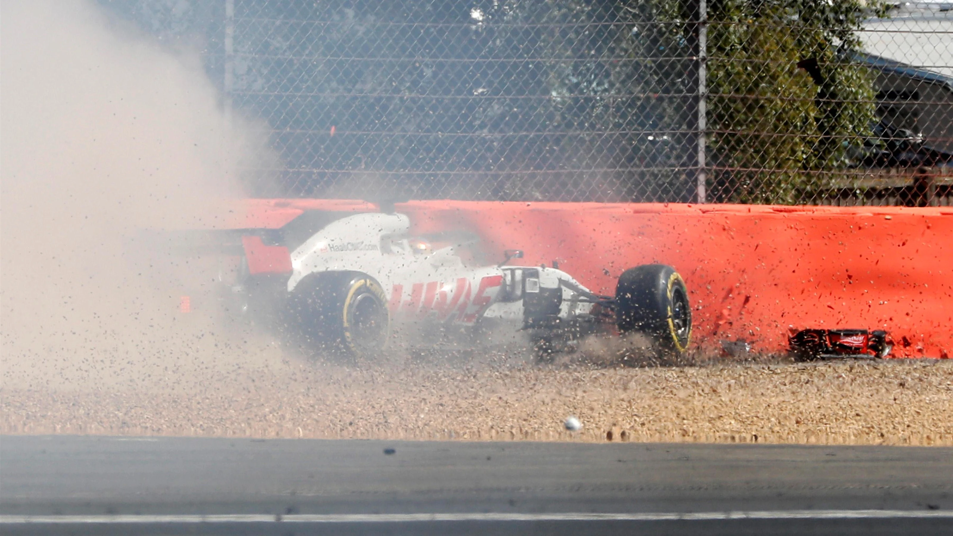 Romain Grosjean (FRA) Haas VF-18 crashing at Formula One World Championship, Rd10, British Grand