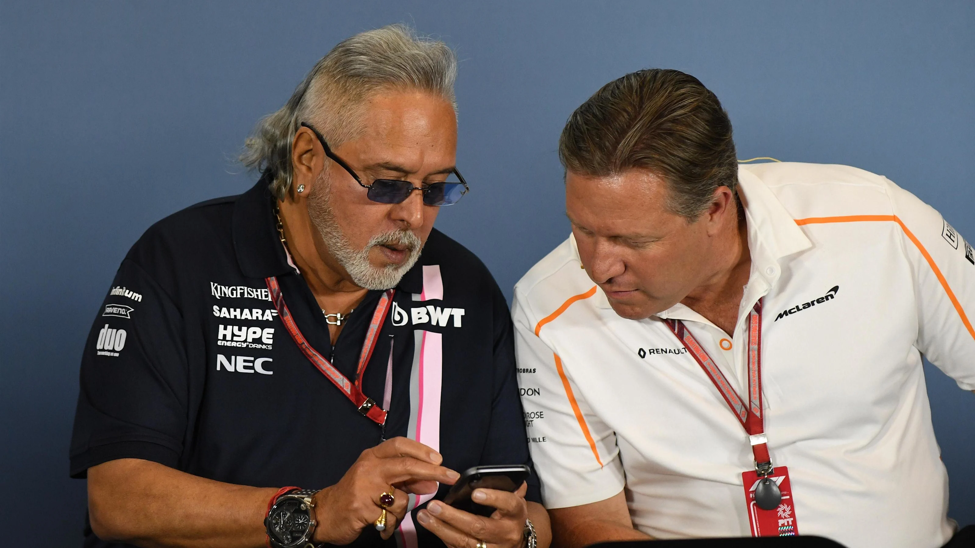 Dr. Vijay Mallya (IND) Force India Formula One Team Owner and Zak Brown (USA) McLaren Racing CEO in