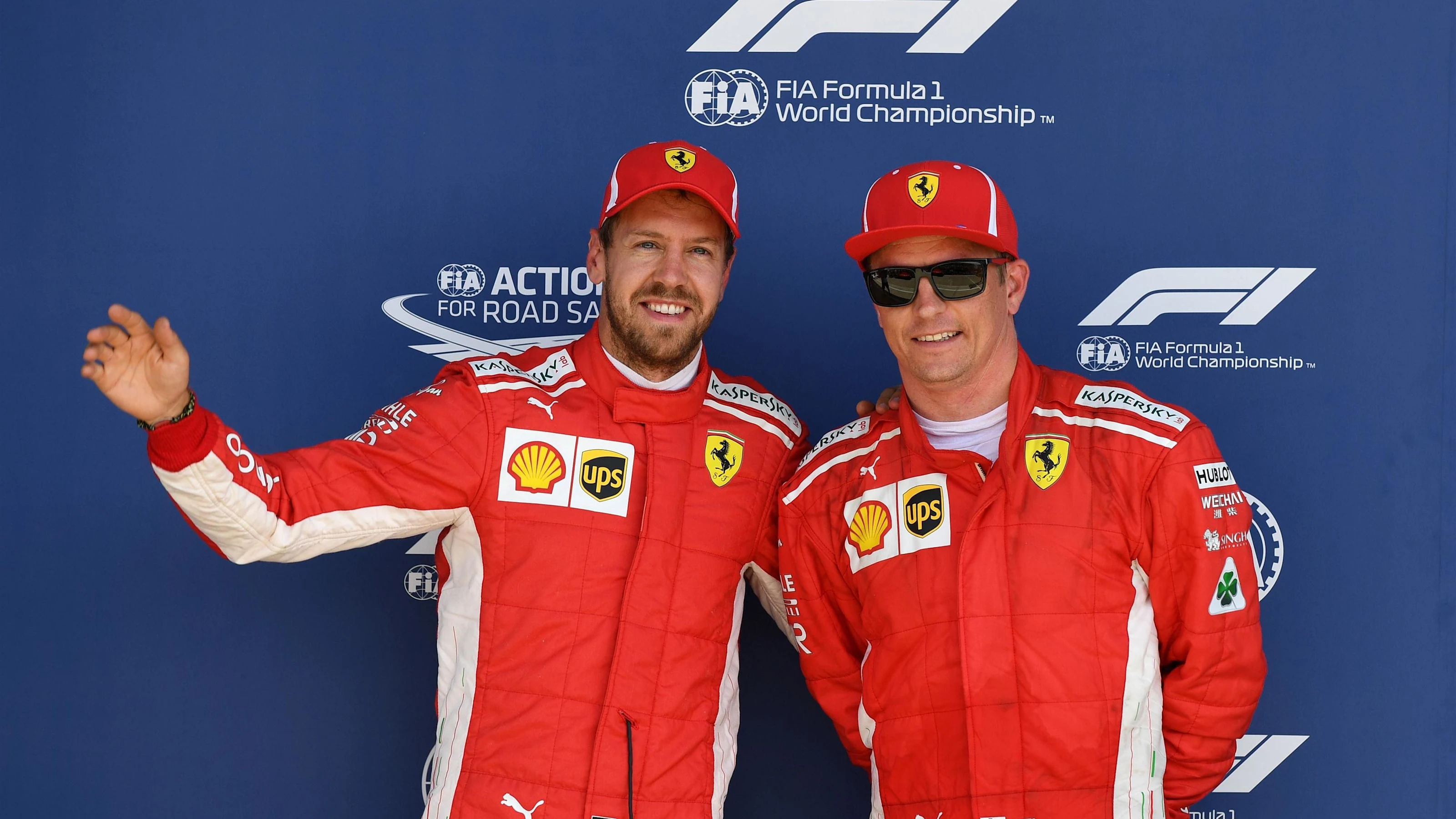 Sebastian Vettel (GER) Ferrari and Kimi Raikkonen (FIN) Ferrari celebrate in parc ferme at Formula