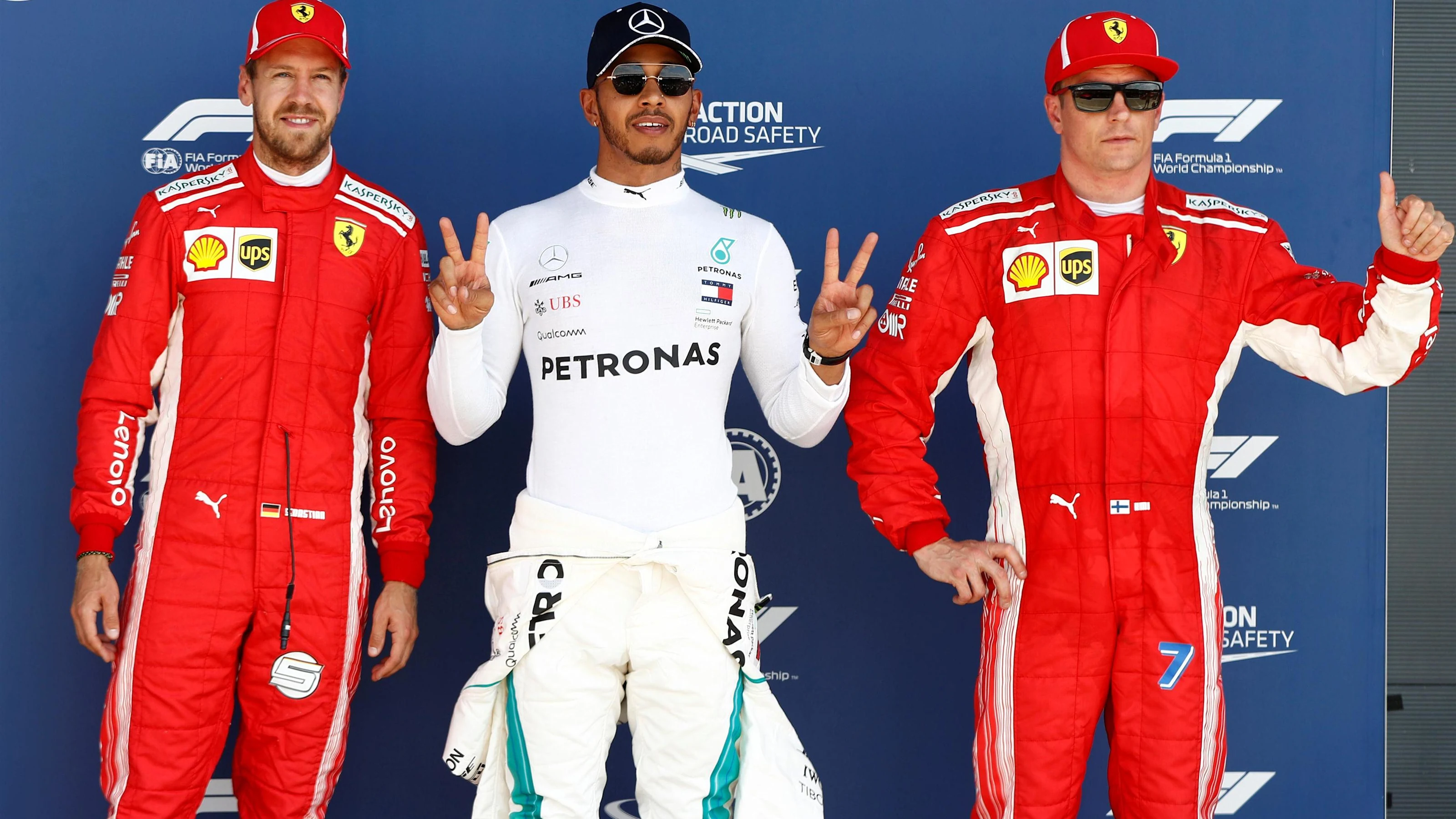 (L to R): Sebastian Vettel (GER) Ferrari, Lewis Hamilton (GBR) Mercedes-AMG F1 and Kimi Raikkonen