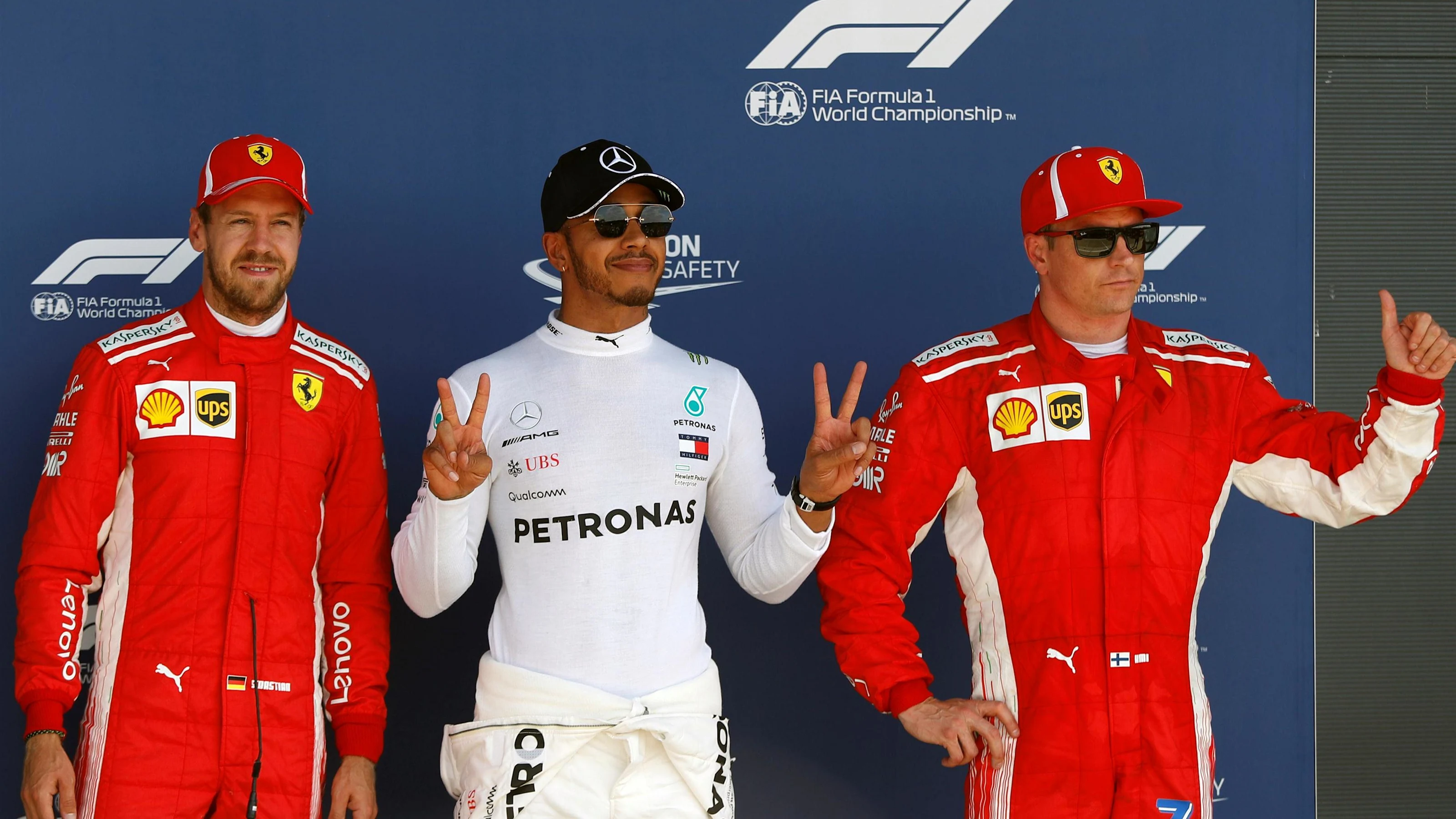 Sebastian Vettel (GER) Ferrari, pole sitter Lewis Hamilton (GBR) Mercedes-AMG F1 and Kimi Raikkonen