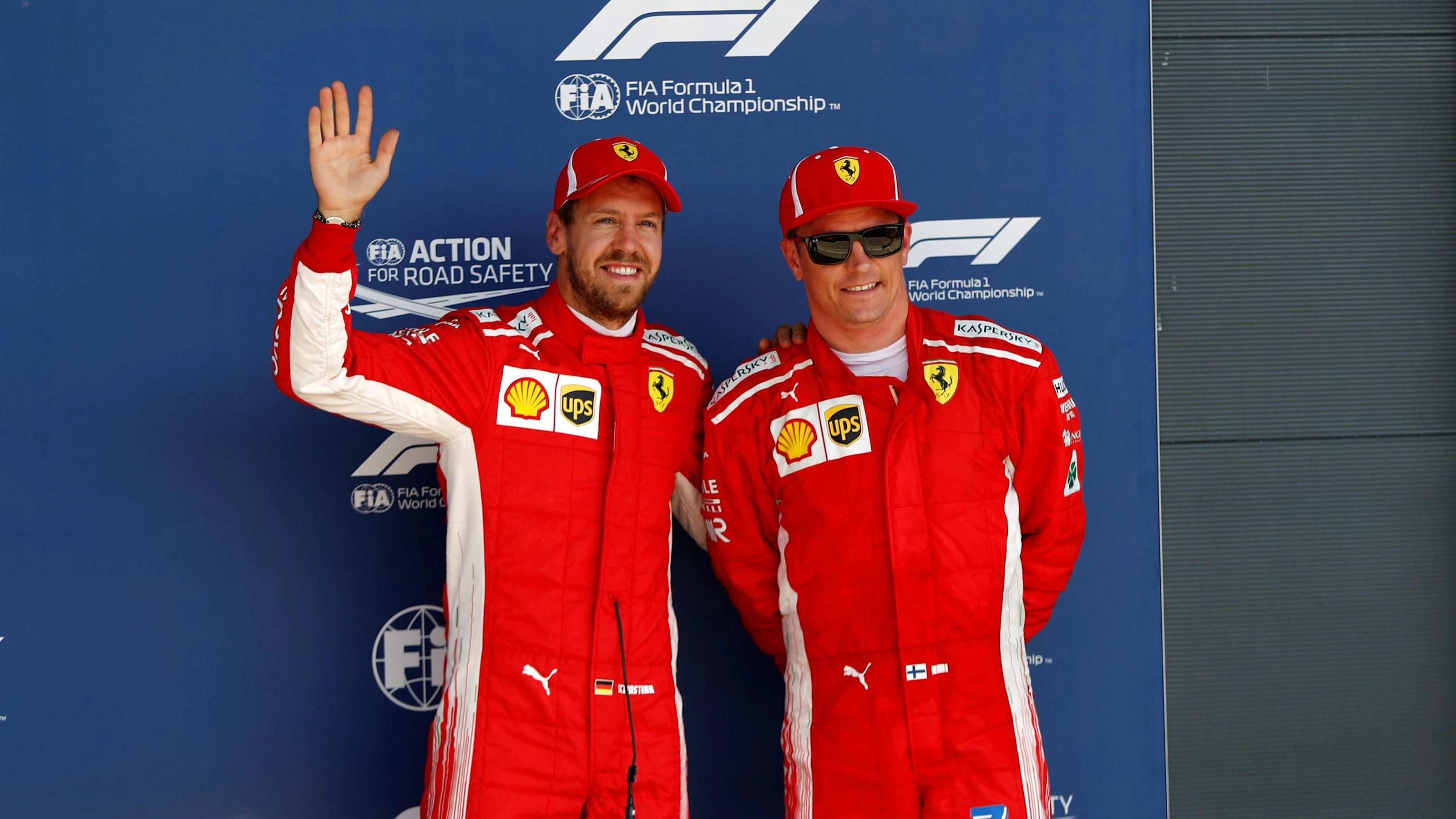 Sebastian Vettel (GER) Ferrari and Kimi Raikkonen (FIN) Ferrari celebrate in parc ferme at Formula