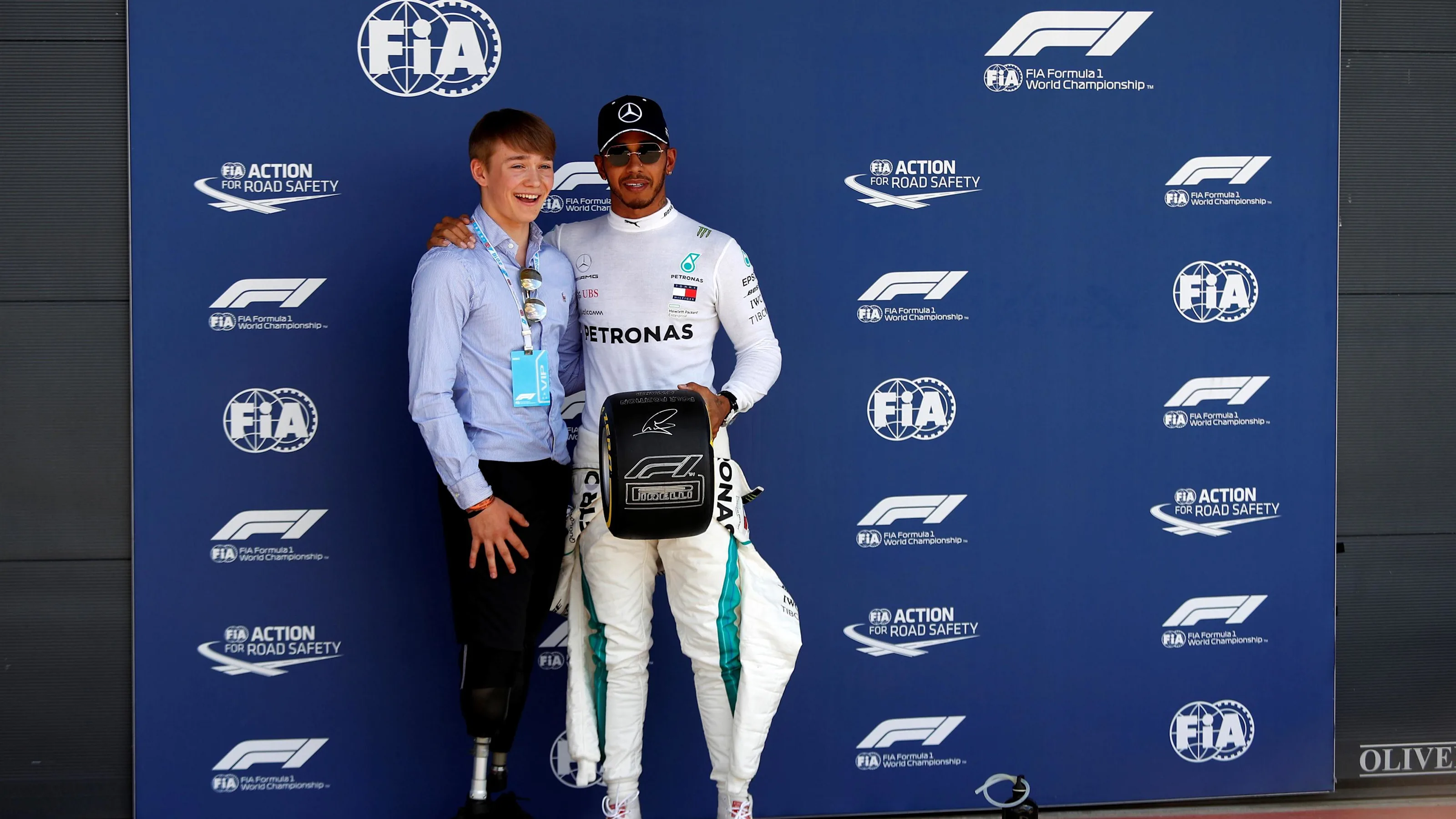 Lewis Hamilton (GBR) Mercedes-AMG F1 receives the Pirelli Pole Position Award from Billy Monger