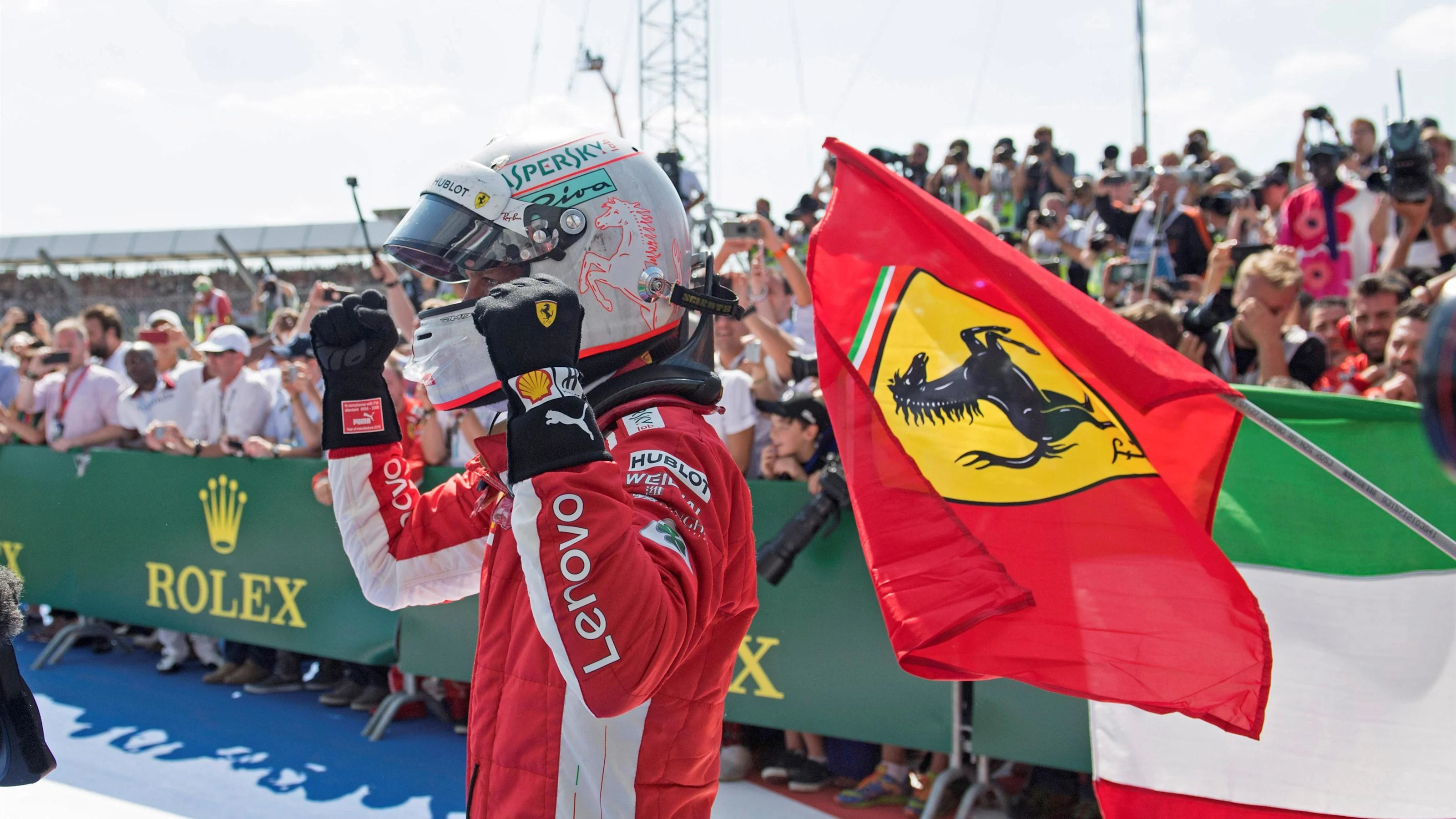 Sebastian Vettel (GER) Ferrari celebrates in parc ferme at Formula One World Championship, Rd10,
