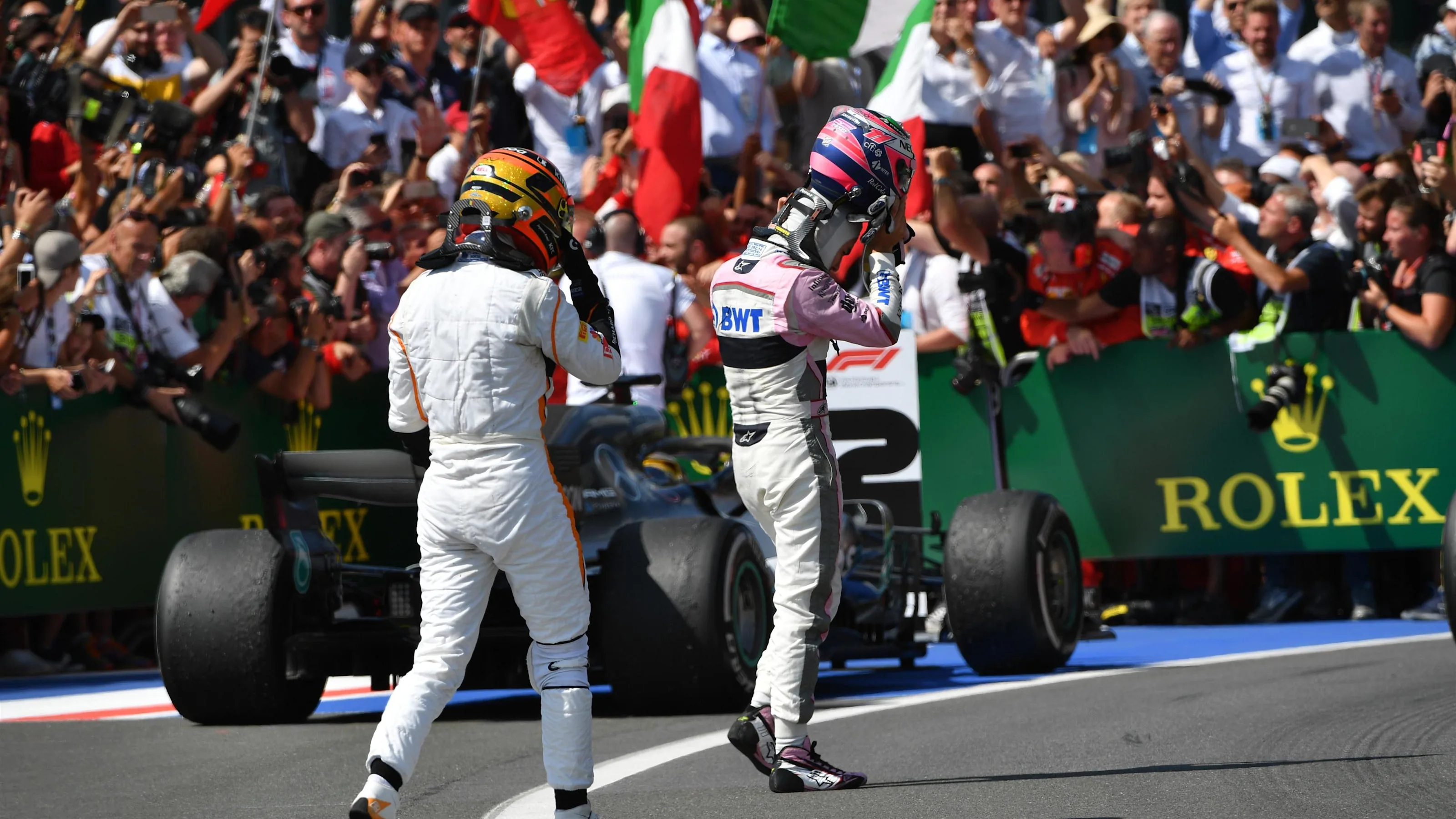 Lewis Hamilton (GBR) Mercedes-AMG F1 and Esteban Ocon (FRA) Force India F1 in parc ferme at Formula