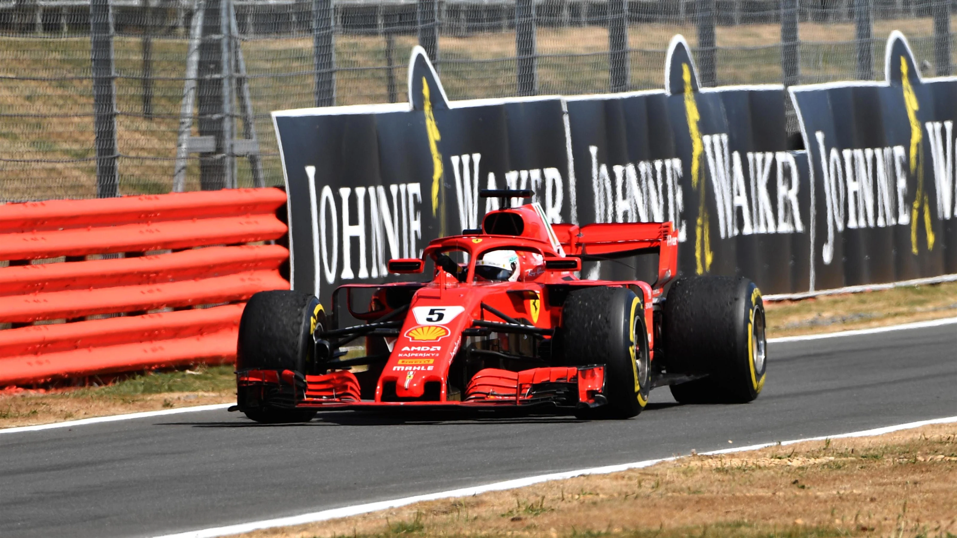 Race winner Sebastian Vettel (GER) Ferrari SF-71H arrives in parc ferme at Formula One World