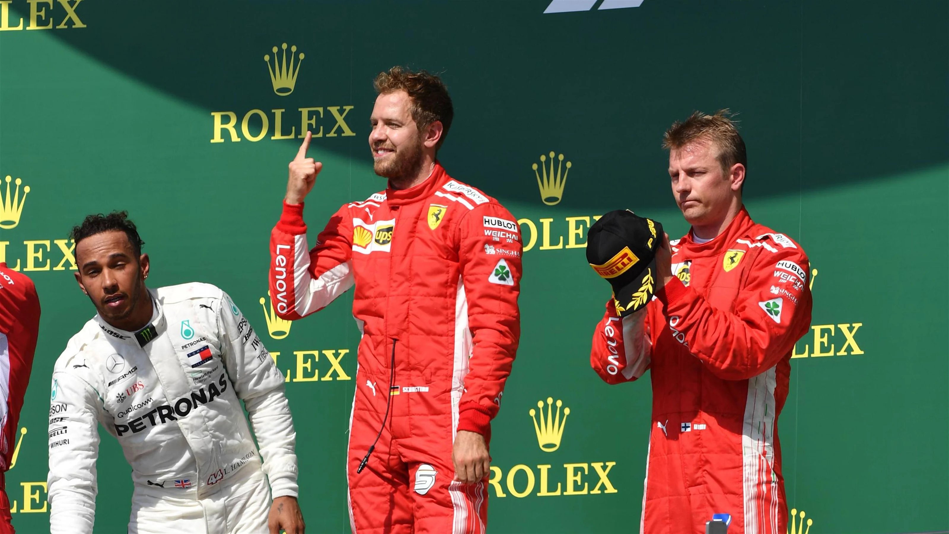 Lewis Hamilton (GBR) Mercedes-AMG F1, Sebastian Vettel (GER) Ferrari and Kimi Raikkonen (FIN)
