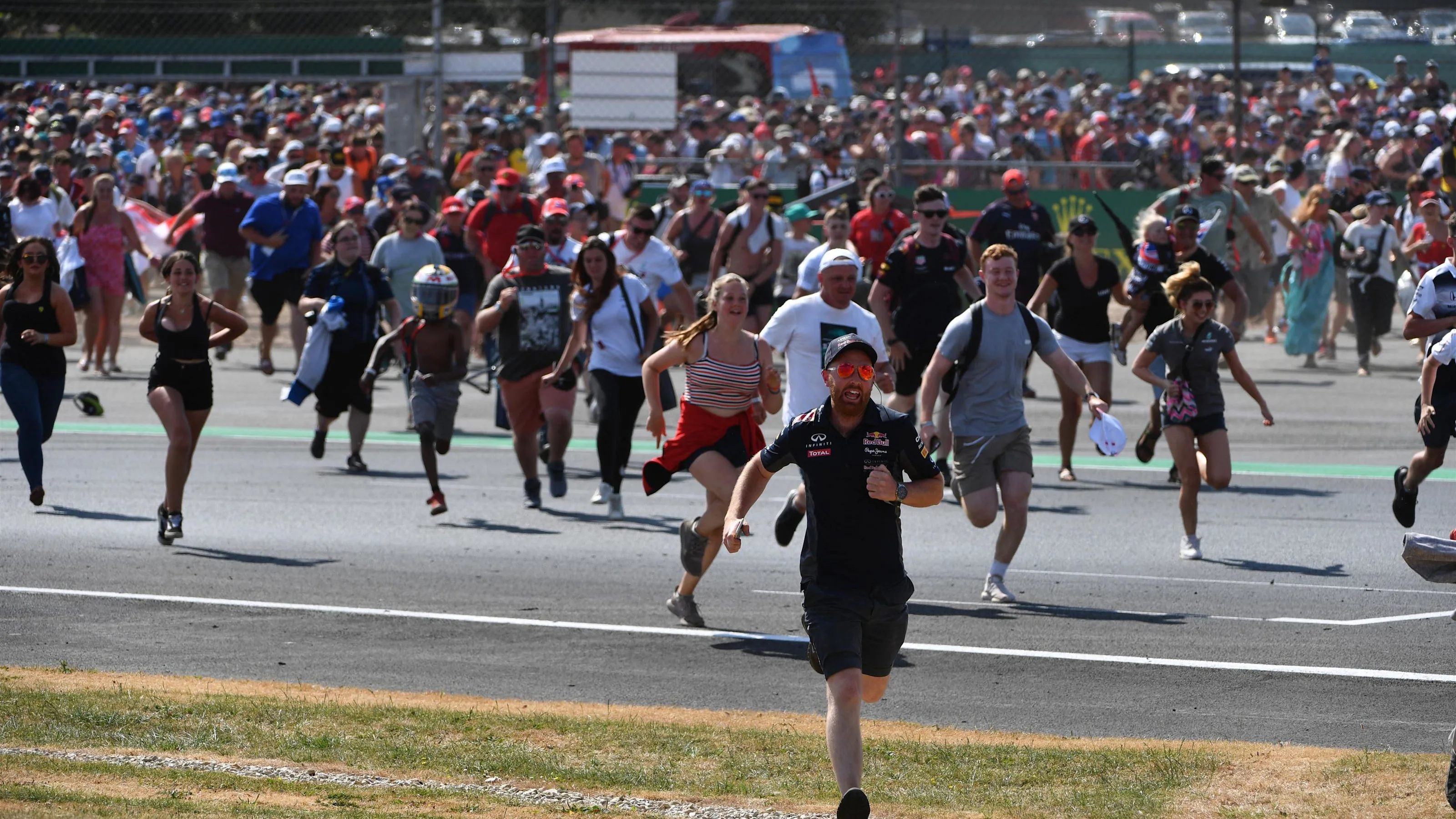 Fans invade the track at Formula One World Championship, Rd10, British Grand Prix, Race,