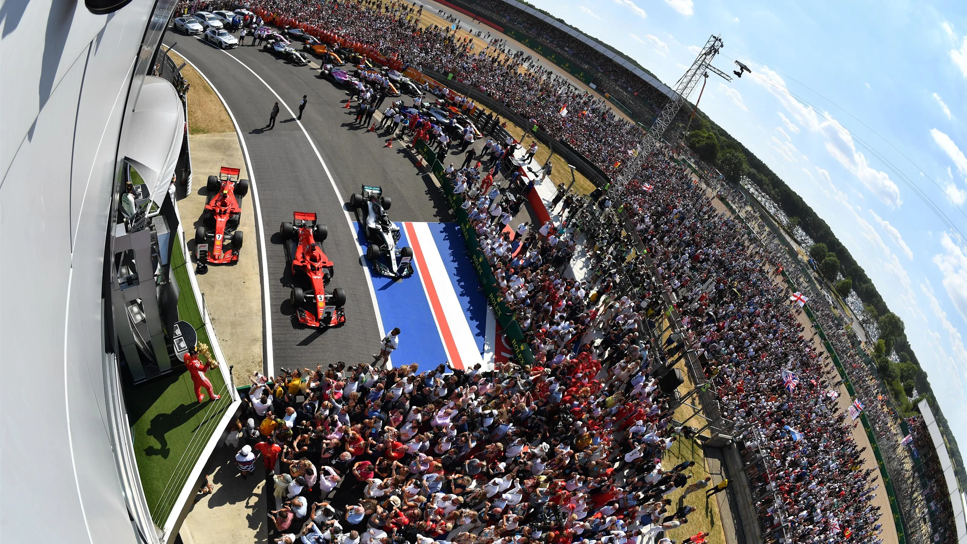 Race winner Sebastian Vettel (GER) Ferrari celebrates on the podium at Formula One World