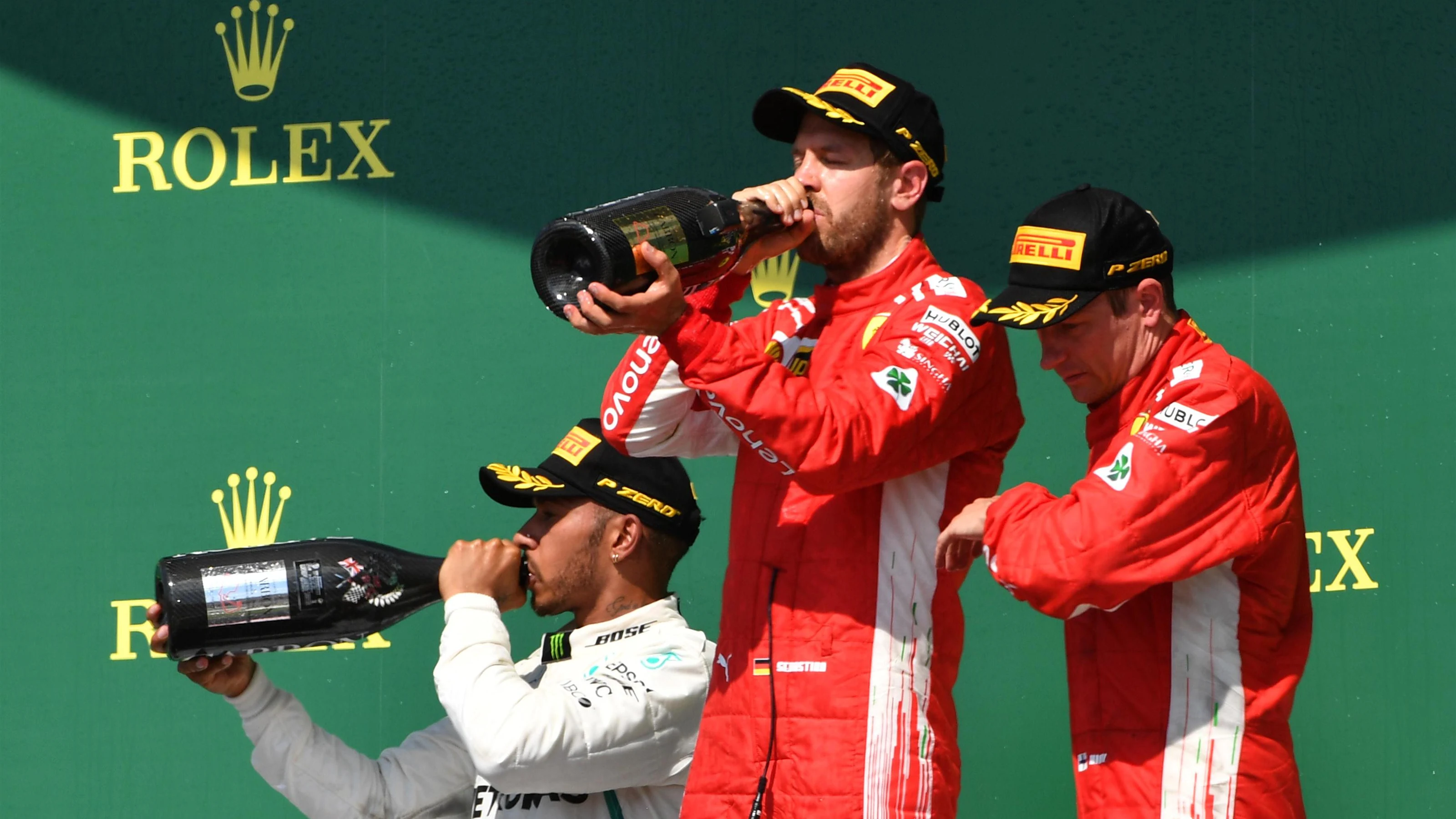 Lewis Hamilton (GBR) Mercedes-AMG F1, Sebastian Vettel (GER) Ferrari and Kimi Raikkonen (FIN)