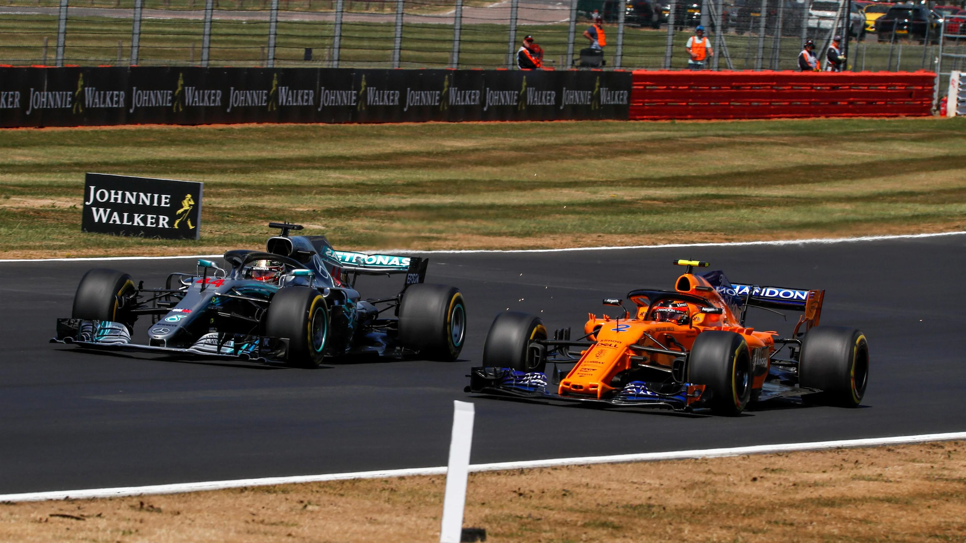Lewis Hamilton (GBR) Mercedes-AMG F1 W09 EQ Power+ and Stoffel Vandoorne (BEL) McLaren MCL33 battle