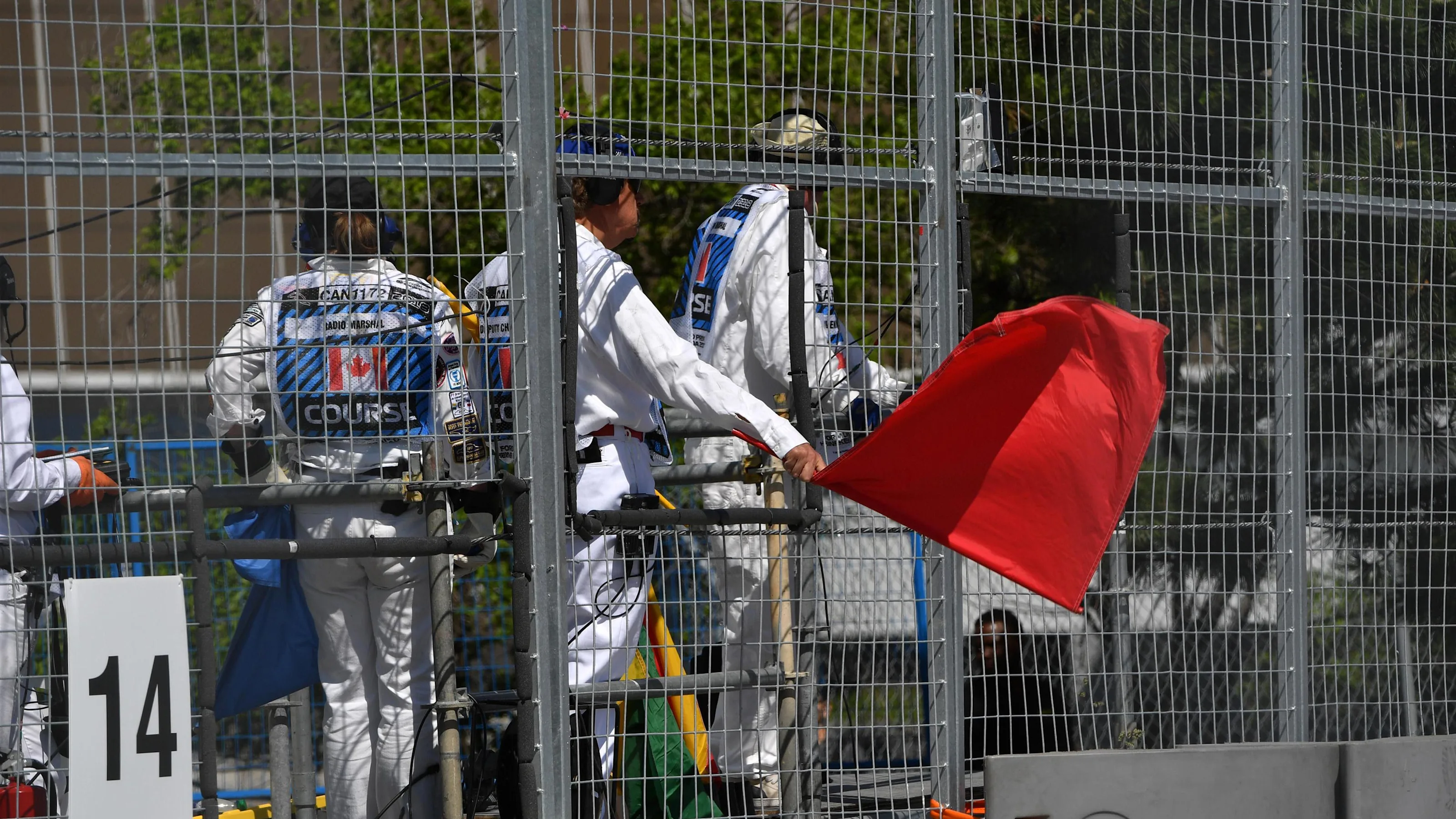 Marshals wave the red flag in FP1 at Formula One World Championship, Rd7, Canadian Grand Prix,