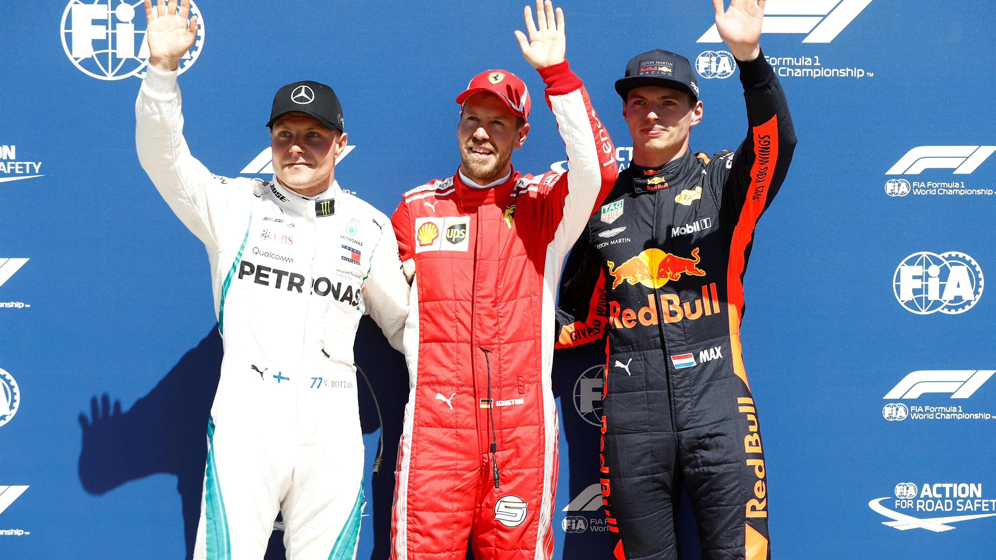 (L to R): Valtteri Bottas (FIN) Mercedes-AMG F1, pole sitter Sebastian Vettel (GER) Ferrari and Max