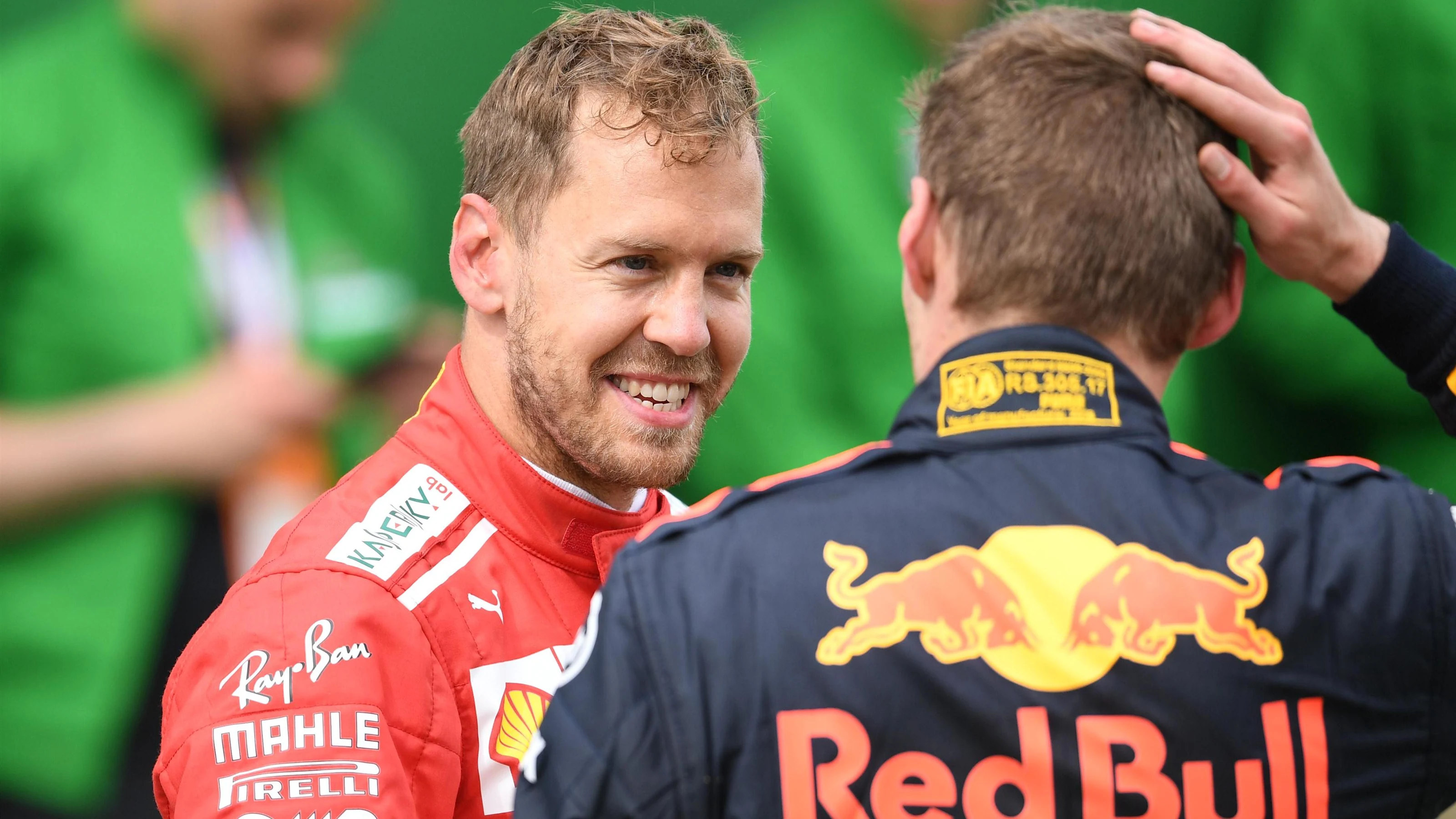 Sebastian Vettel (GER) Ferrari and Max Verstappen (NED) Red Bull Racing in parc ferme at Formula