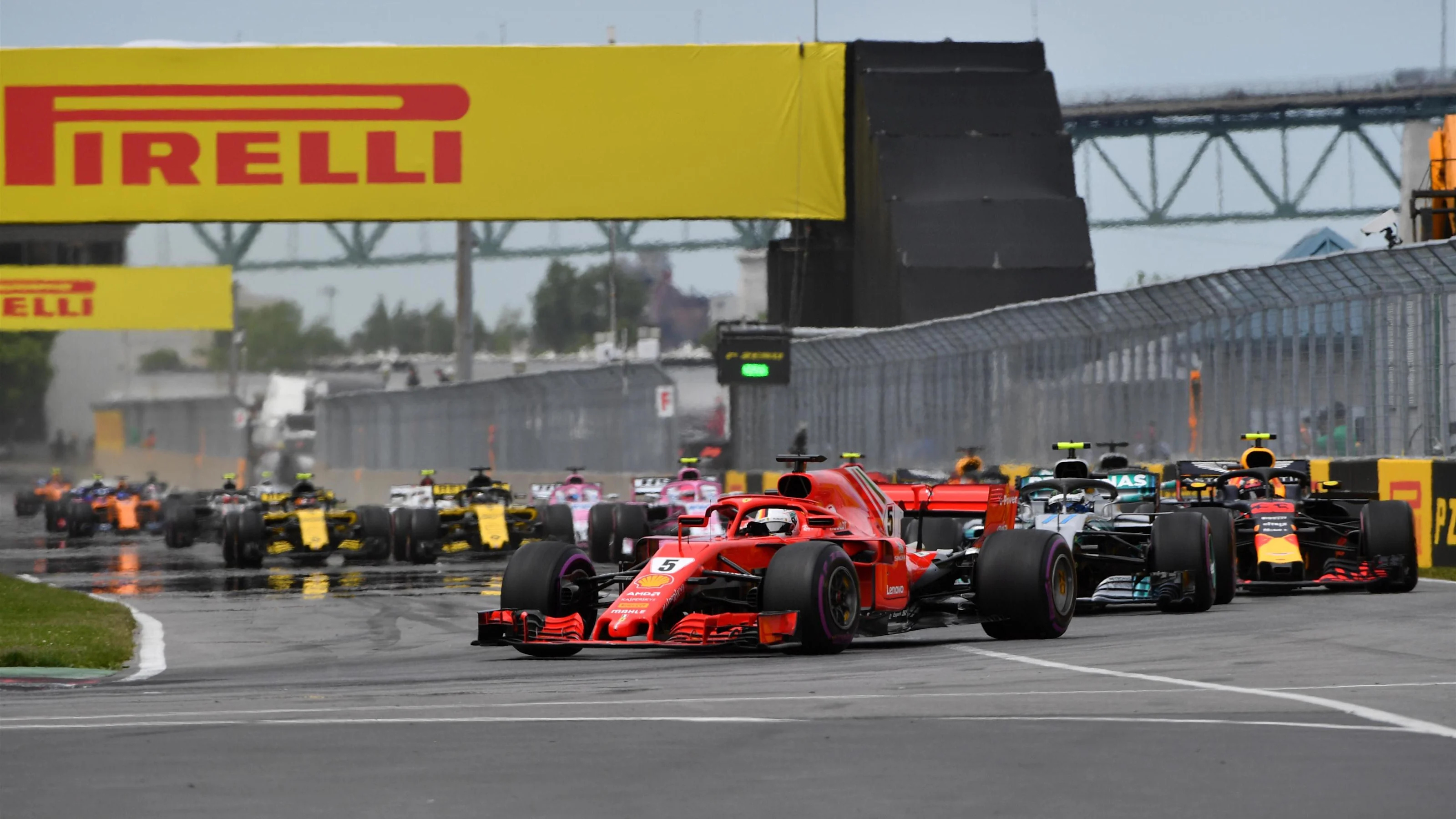 Simon Lazenby (GBR) Sky TV leads Valtteri Bottas (FIN) Mercedes-AMG F1 W09 EQ Power+ at the start