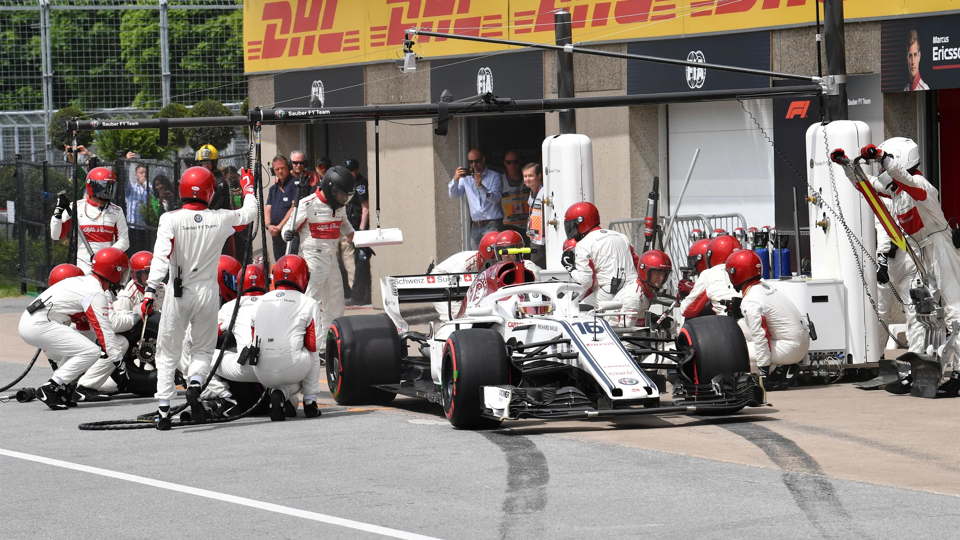 Charles Leclerc (MON) Alfa Romeo Sauber C37 pit stop at Formula One World Championship, Rd7,