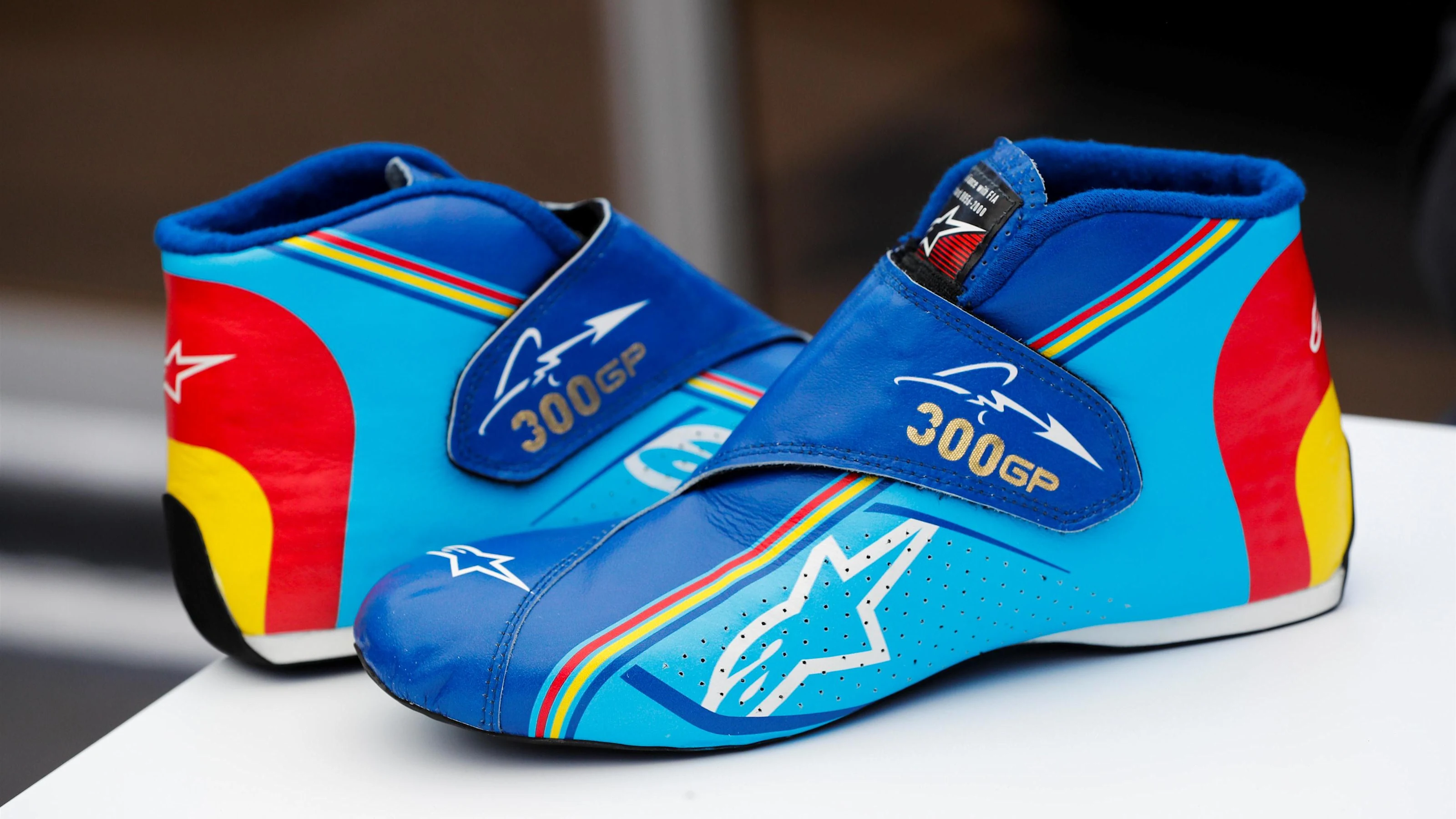 The Alpinestars boots of Fernando Alonso (ESP) McLaren to celebrate his 300th GP at Formula One