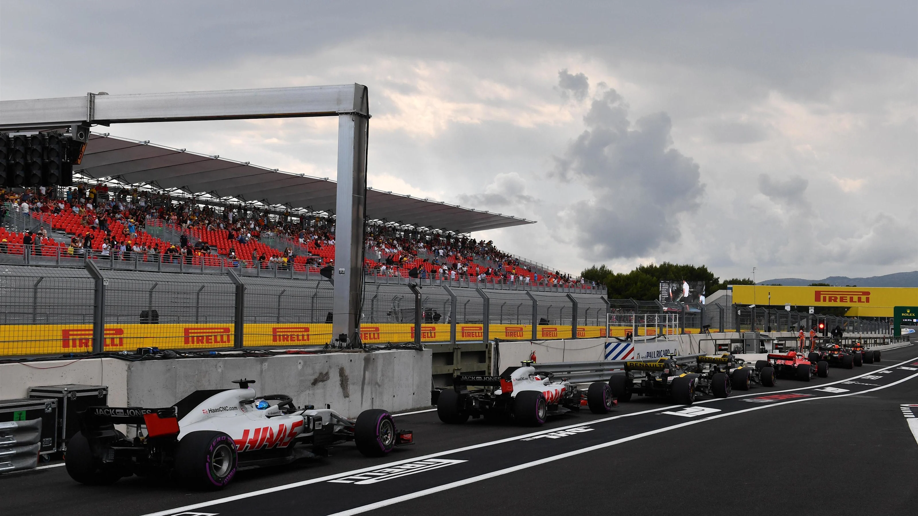 Cars queued in pit lane at Formula One World Championship, Rd8, French Grand Prix, Qualifying, Paul