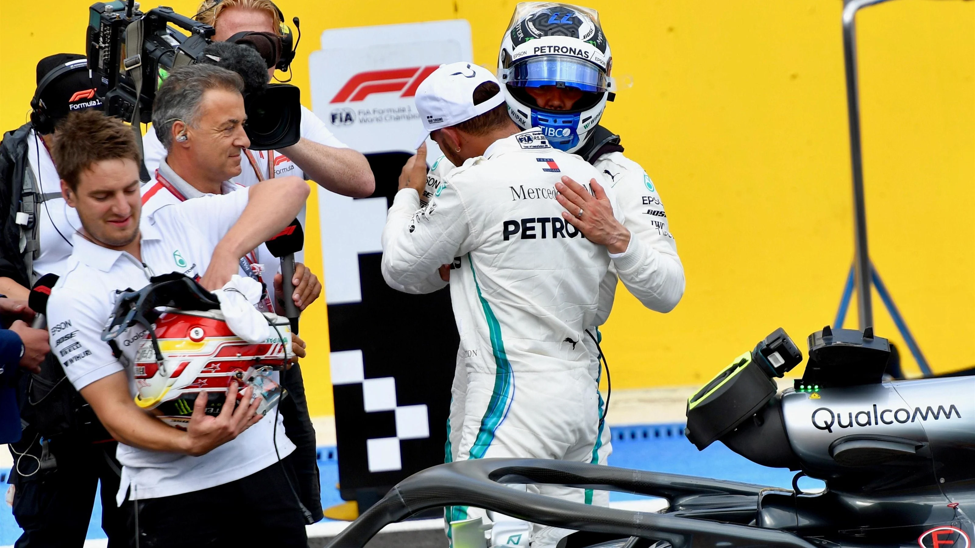 Pole sitter Lewis Hamilton (GBR) Mercedes-AMG F1 celebrates in parc ferme with Valtteri Bottas