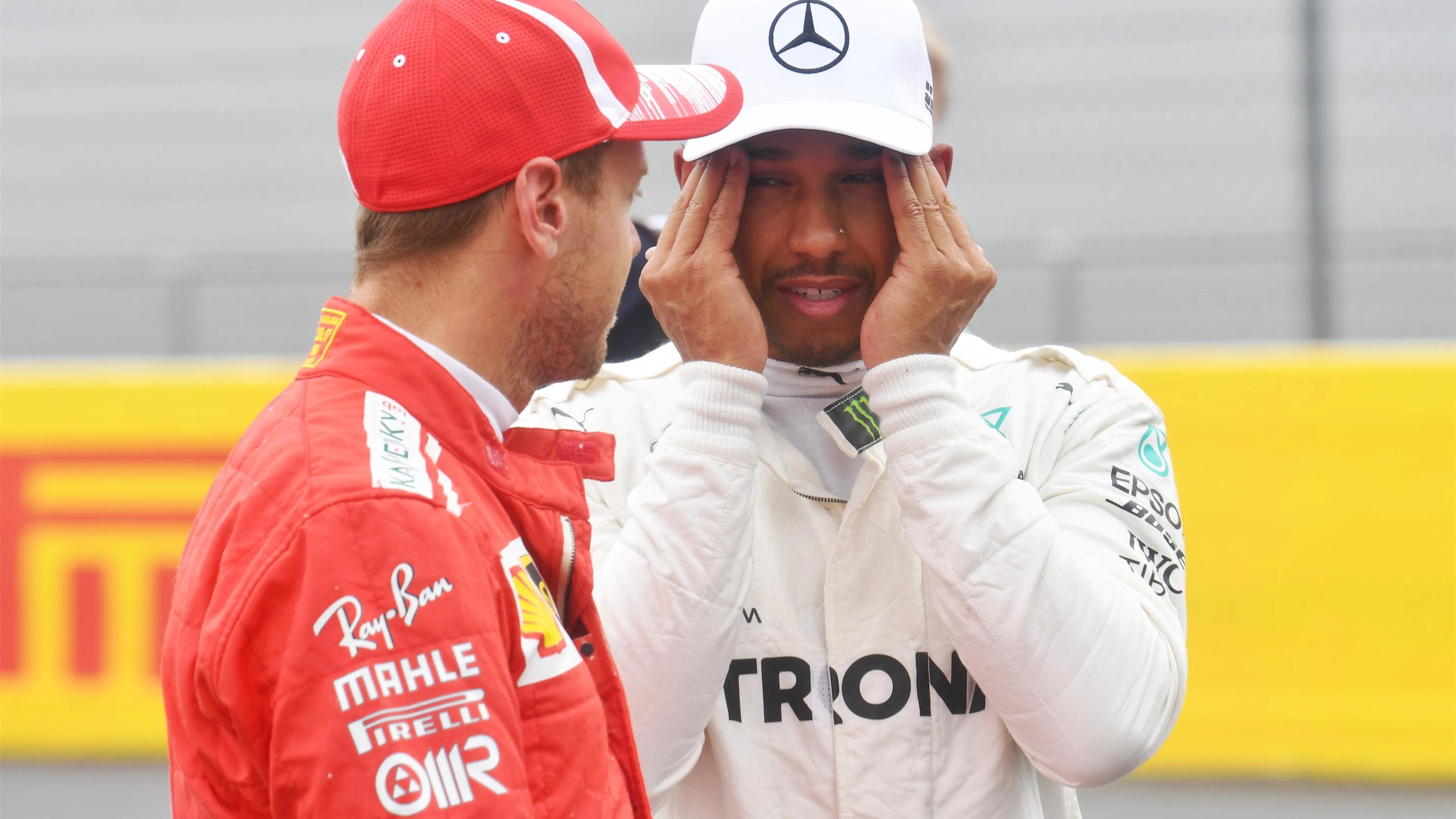 Lewis Hamilton (GBR) Mercedes-AMG F1 and Sebastian Vettel (GER) Ferrari celebrate in parc ferme at