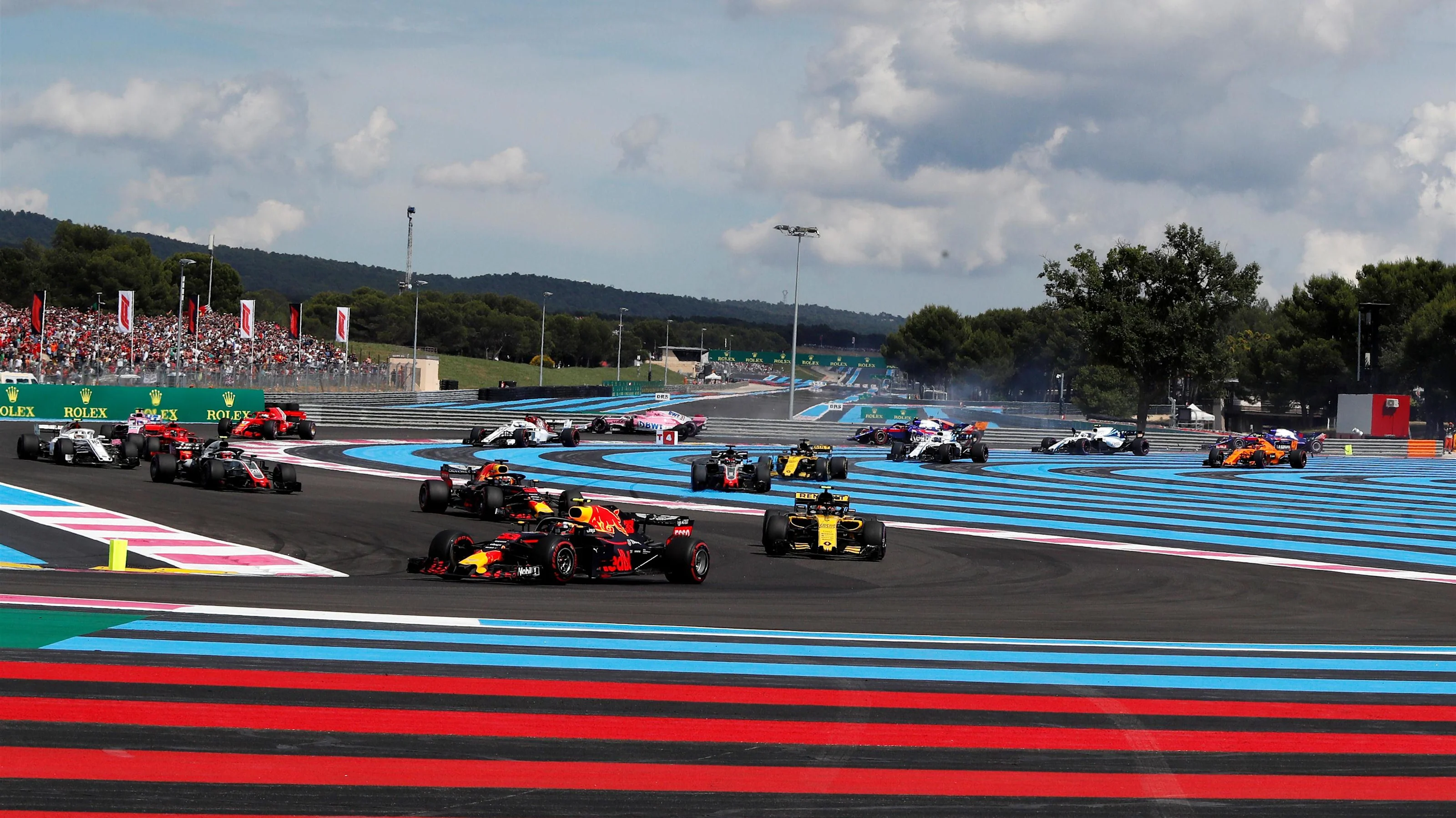 Max Verstappen (NED) Red Bull Racing RB14 as Esteban Ocon (FRA) Force India VJM11 and Pierre Gasly