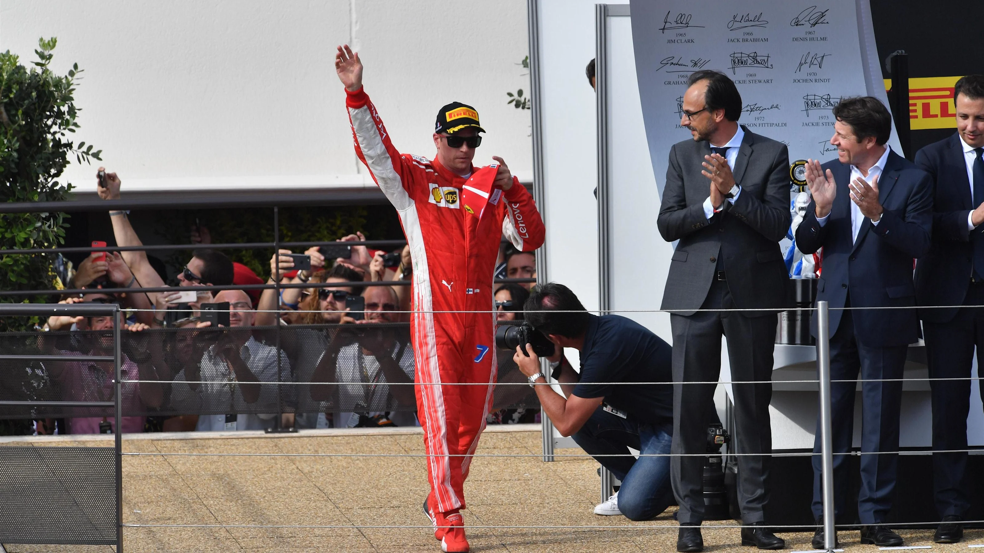 Kimi Raikkonen (FIN) Ferrari celebrates on the podium at Formula One World Championship, Rd8,