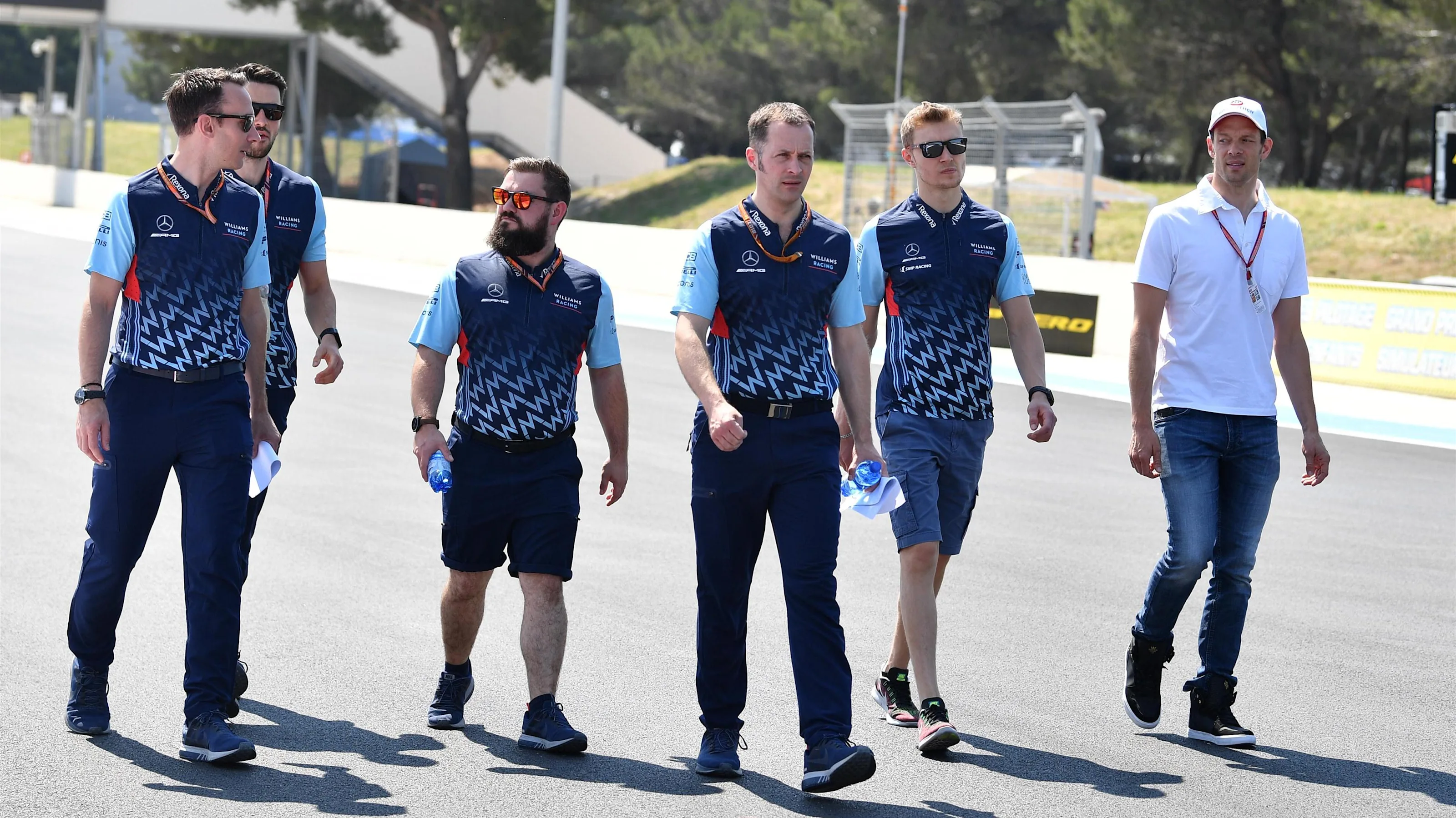 Sergey Sirotkin (RUS) Williams walks the track with Alex Wurz (AUT) Williams Driver Coach at