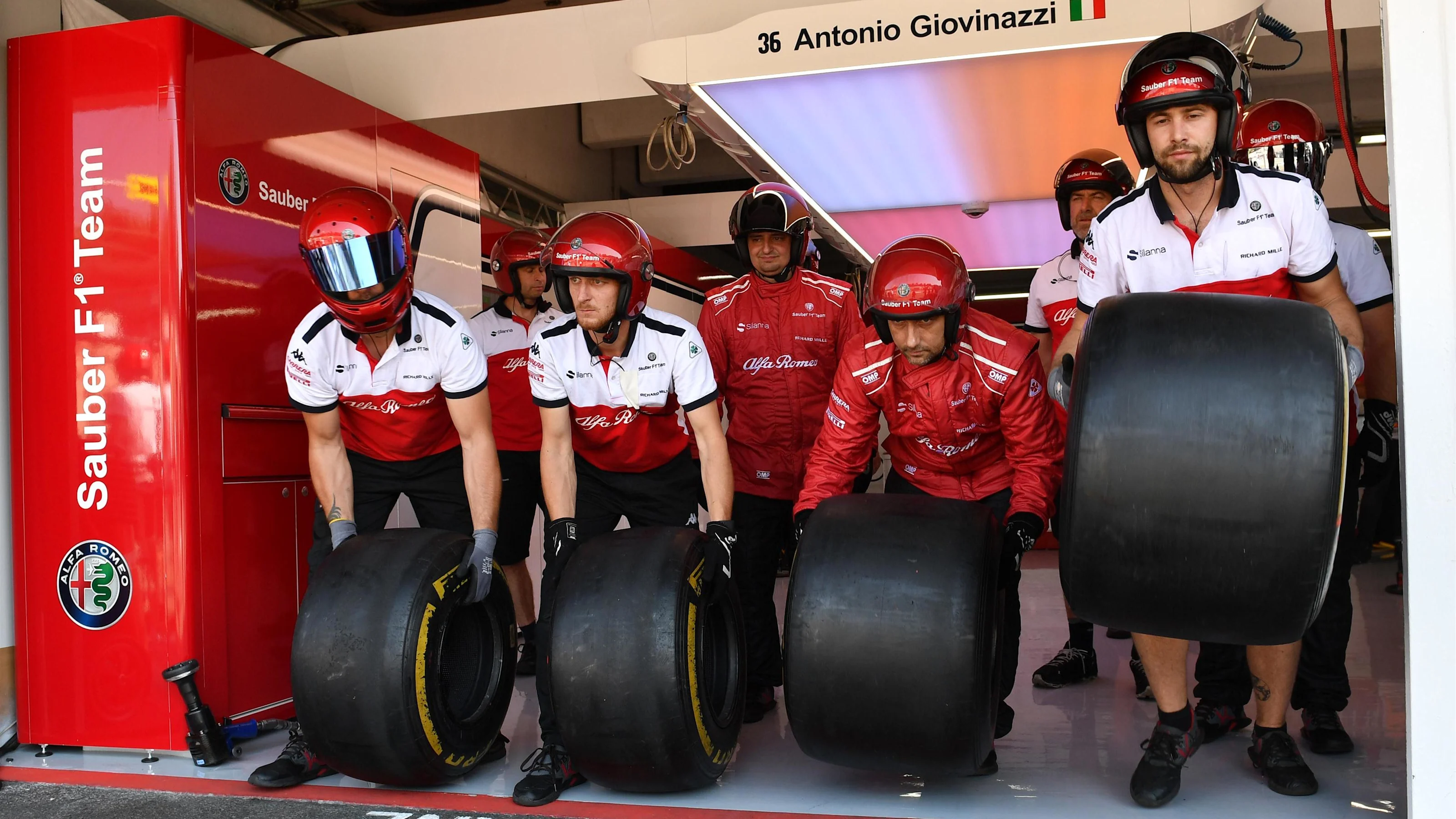 Alfa Romeo Sauber F1 Team mechanics at Formula One World Championship, Rd11, German Grand Prix,
