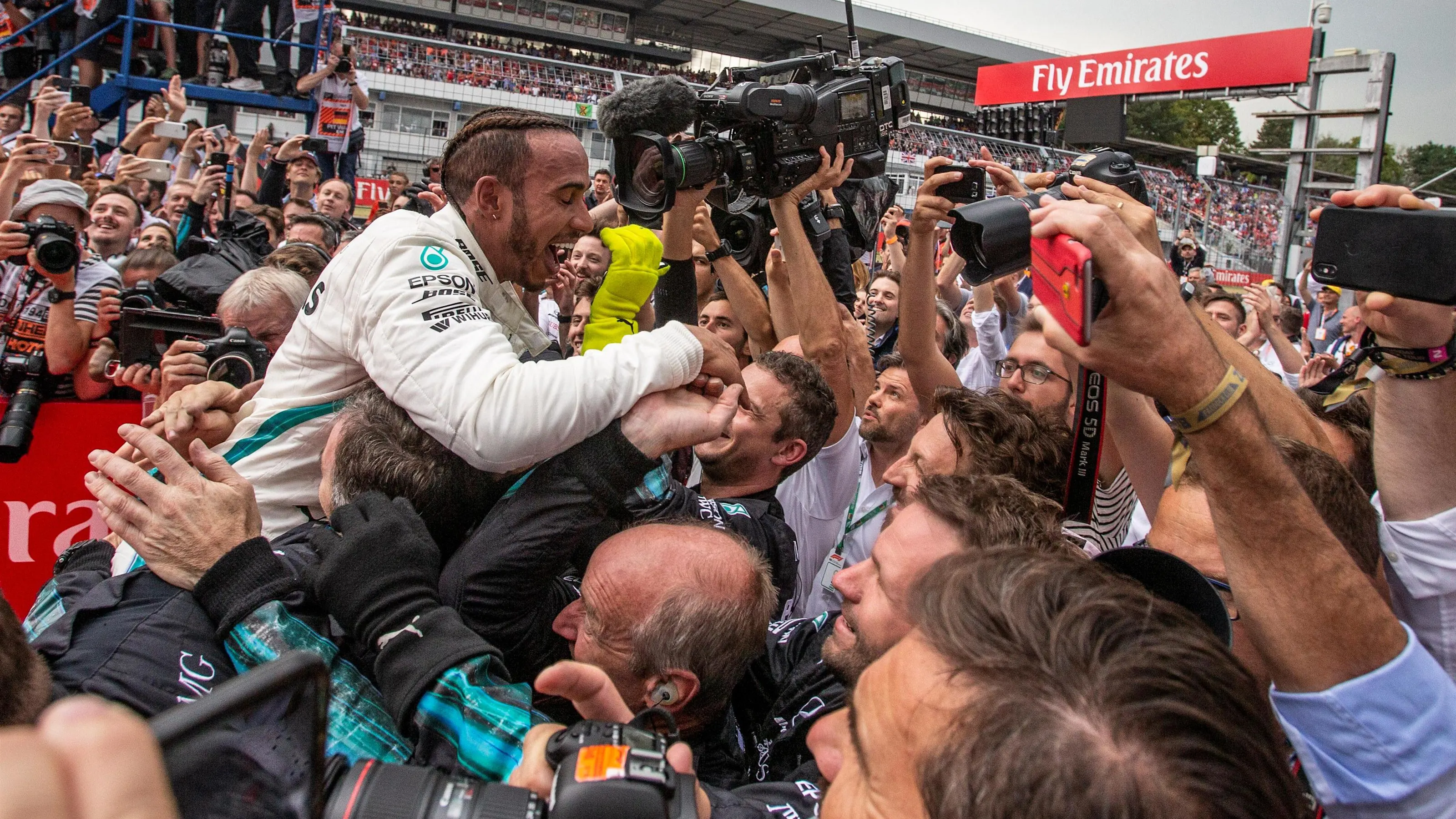 Lewis Hamilton (GBR) Mercedes-AMG F1 celebrates with team in parc ferme at Formula One World