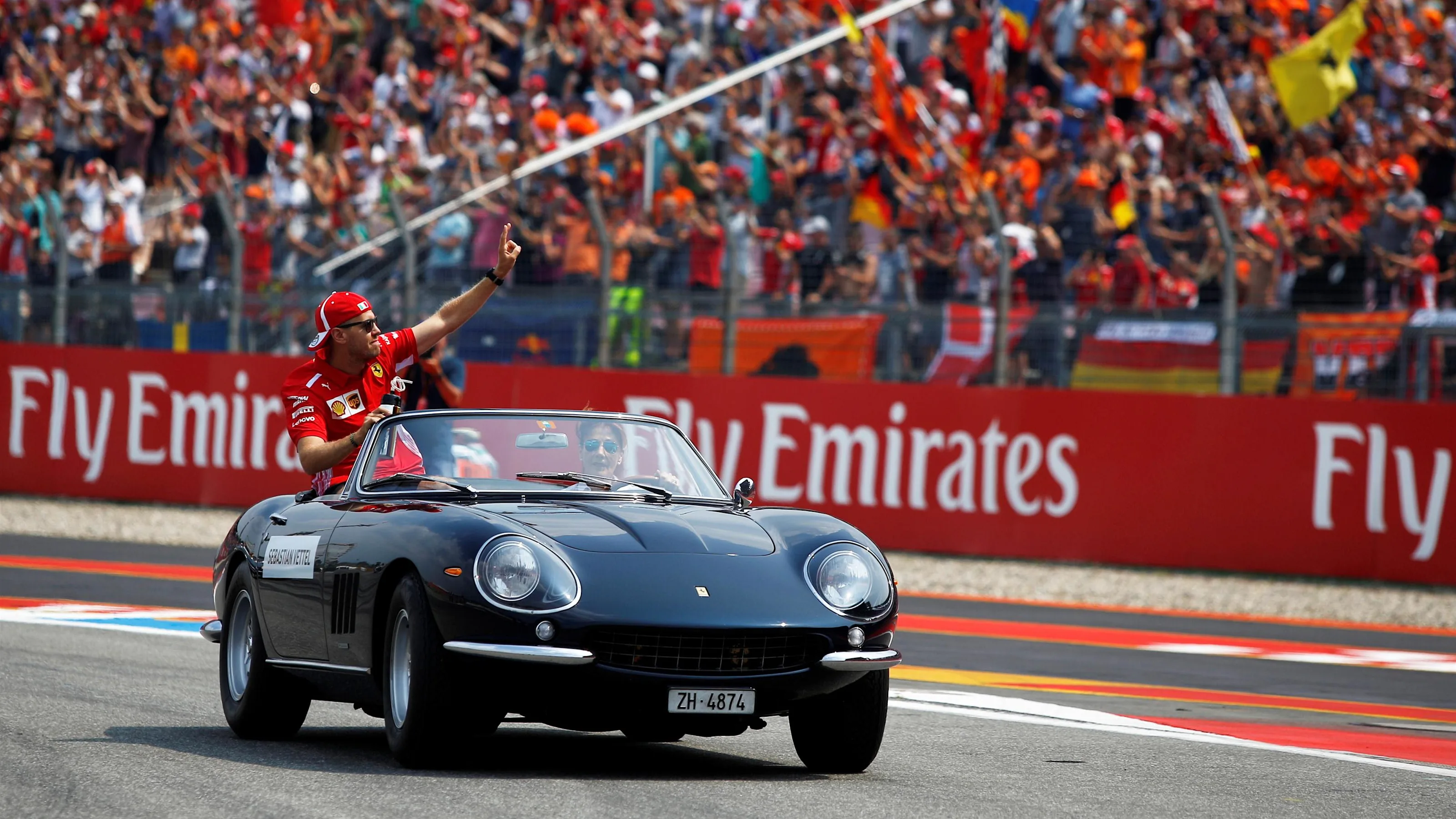 Sebastian Vettel (GER) Ferrari on the drivers parade Formula One World Championship, Rd11, German