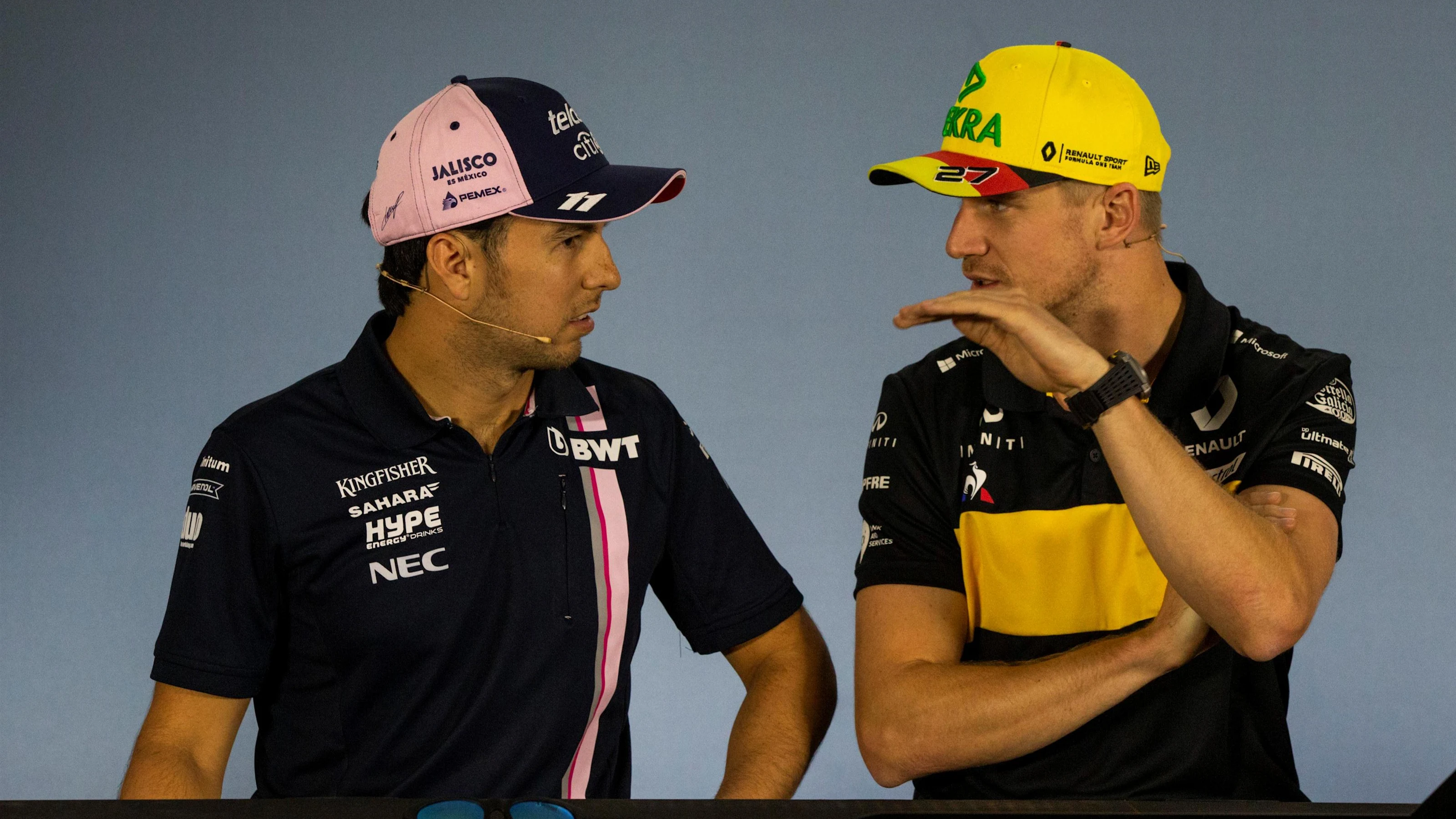 Sergio Perez (MEX) Force India and Nico Hulkenberg (GER) Renault Sport F1 Team in the Press