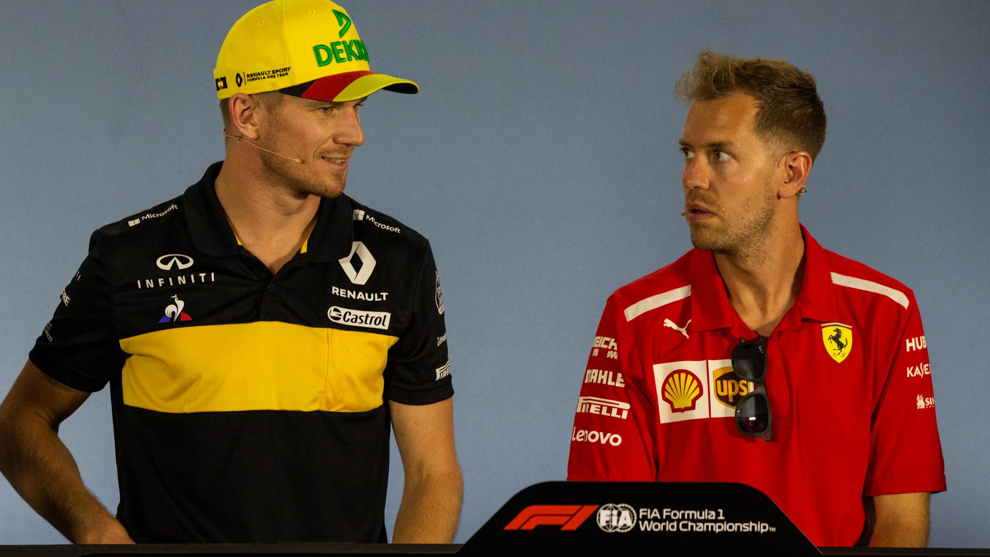 Nico Hulkenberg (GER) Renault Sport F1 Team and Sebastian Vettel (GER) Ferrari in the Press