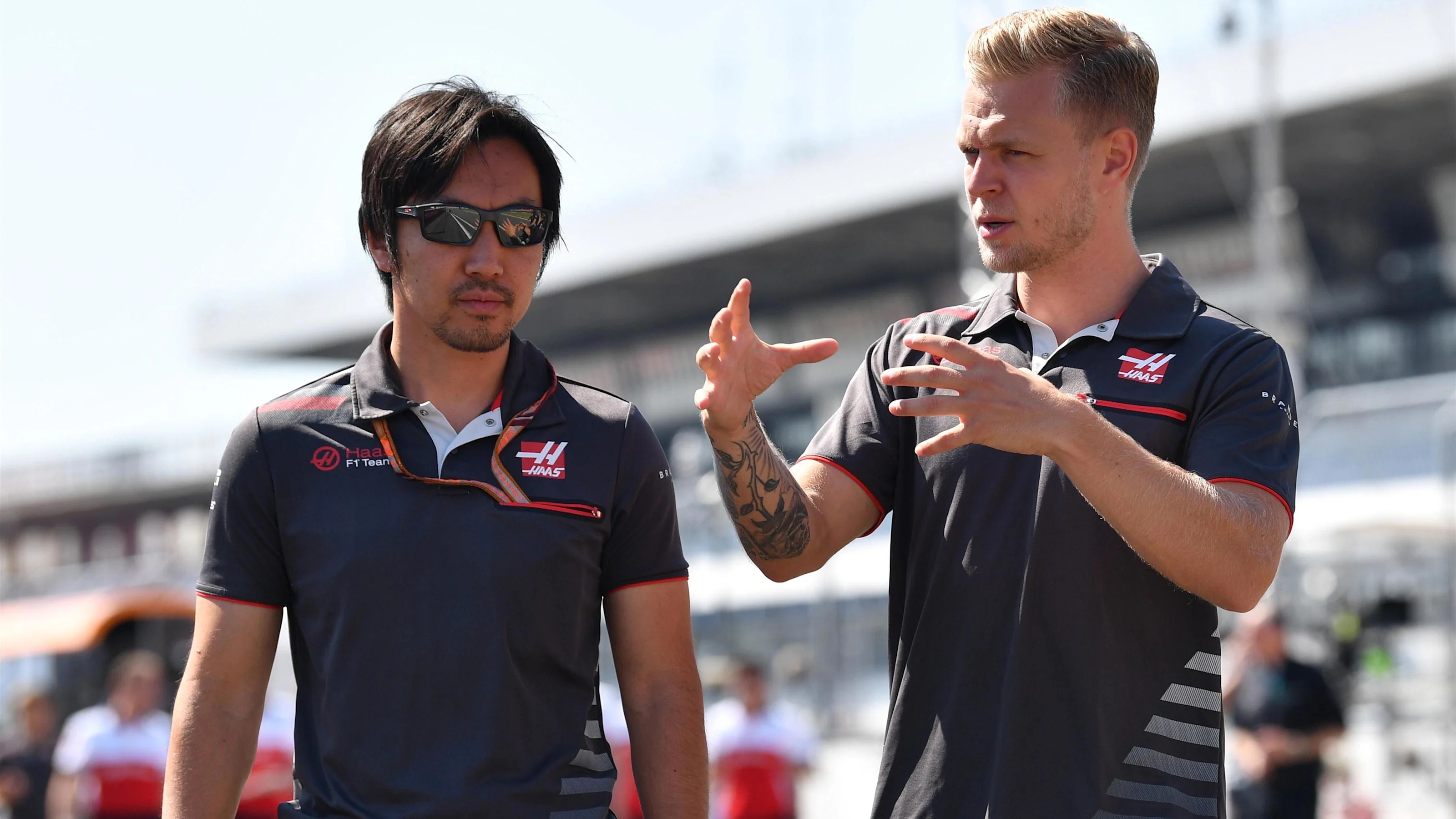 Ayao Komatsu (JPN) Haas F1 Engineer and Kevin Magnussen (DEN) Haas F1 at Formula One World