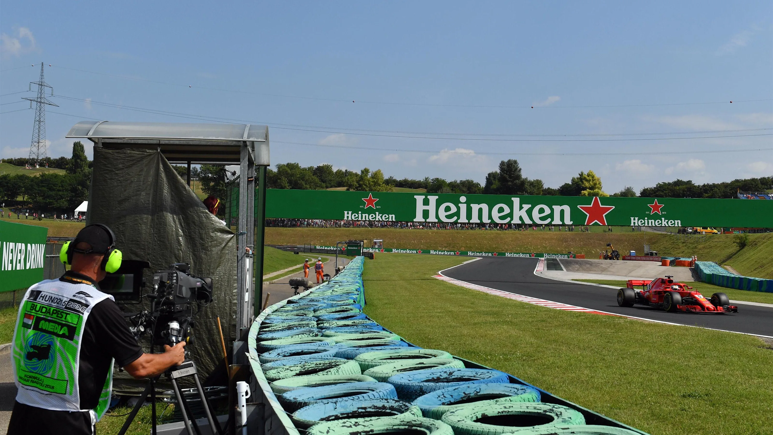 Sebastian Vettel (GER) Ferrari SF-71H and cameraman at Formula One World Championship, Rd12,