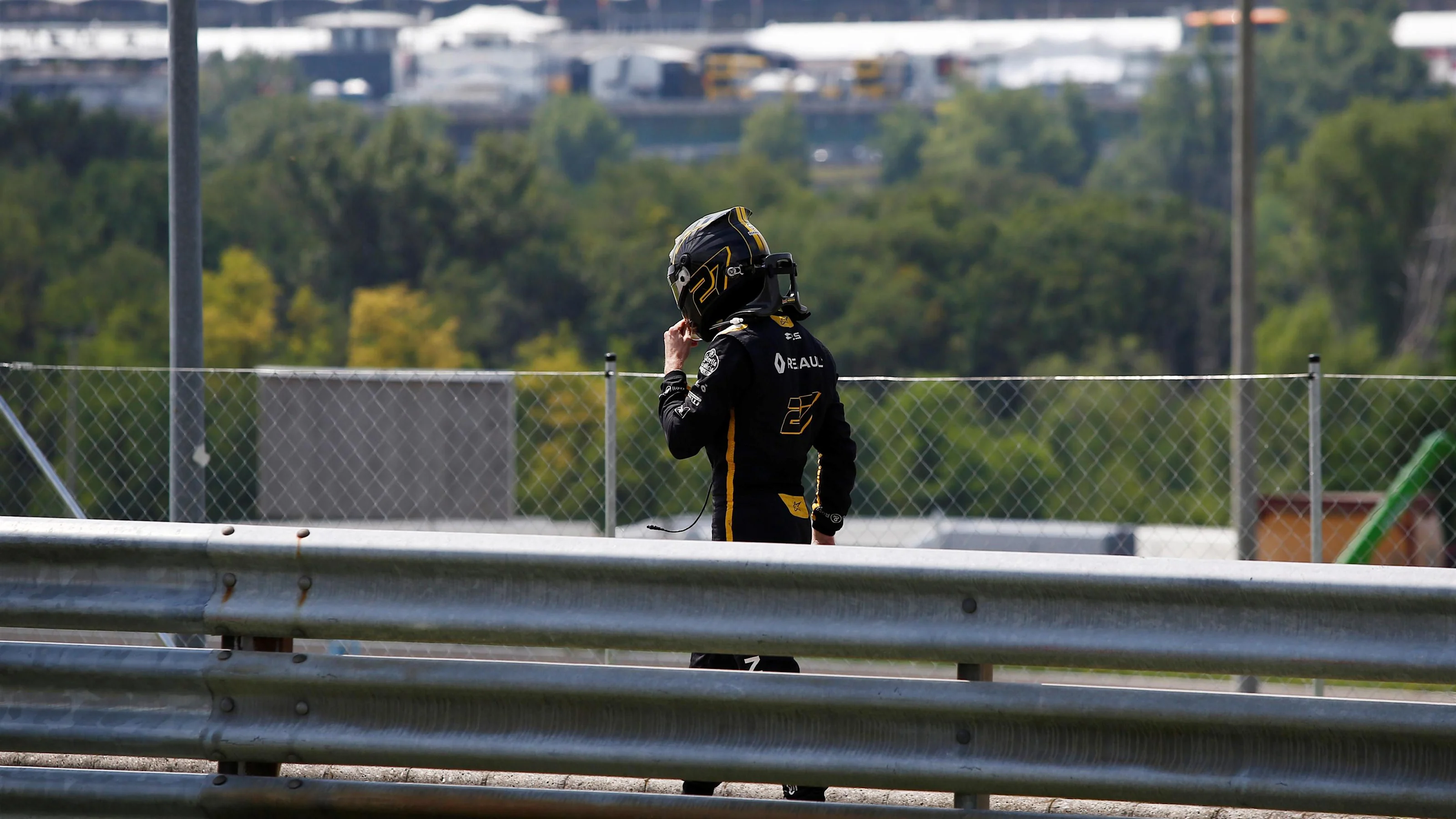 Nico Hulkenberg (GER) Renault Sport F1 Team walks in after stopping on track in FP1 Formula One