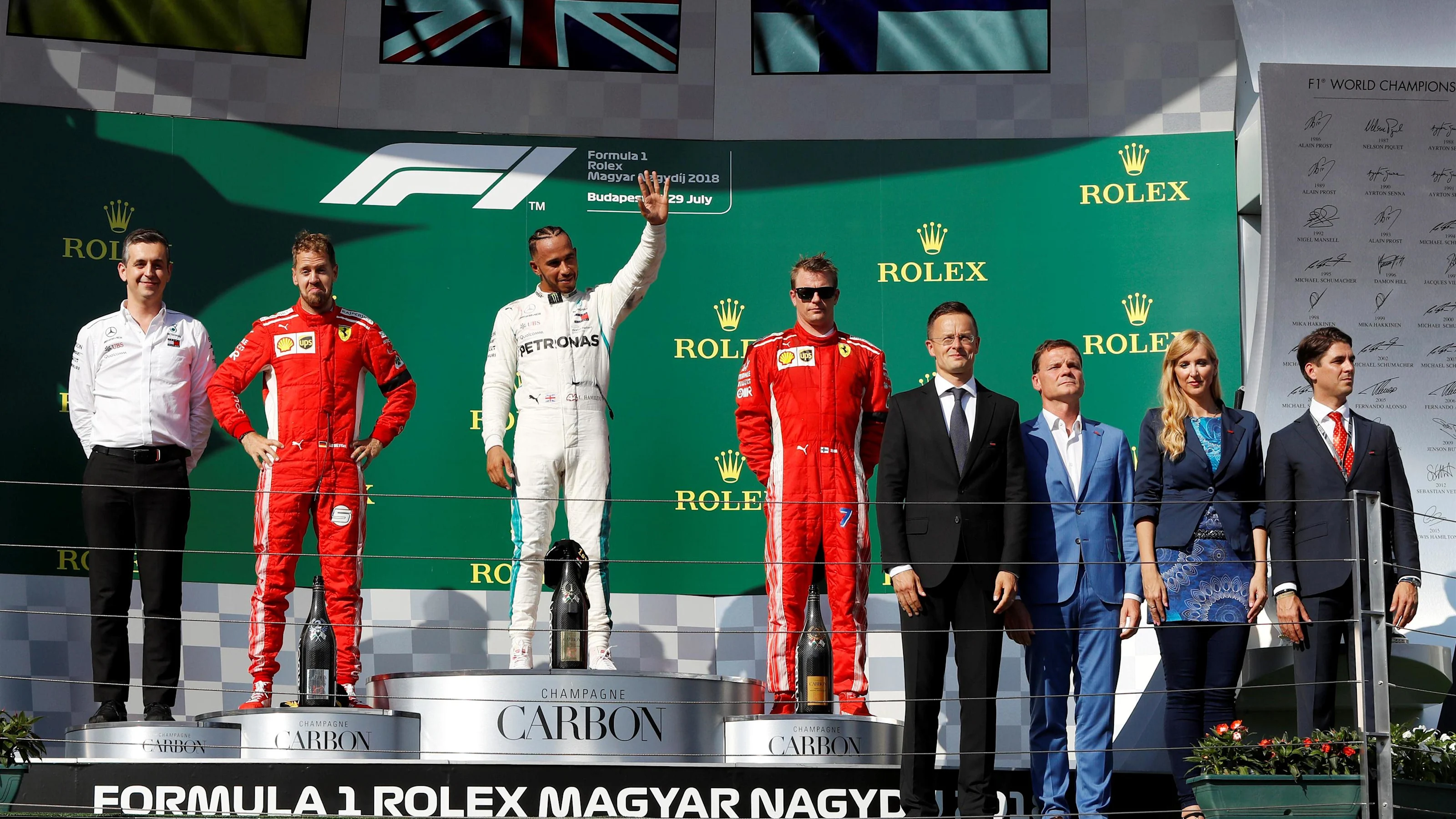 Sebastian Vettel (GER) Ferrari, Lewis Hamilton (GBR) Mercedes-AMG F1 and Kimi Raikkonen (FIN)