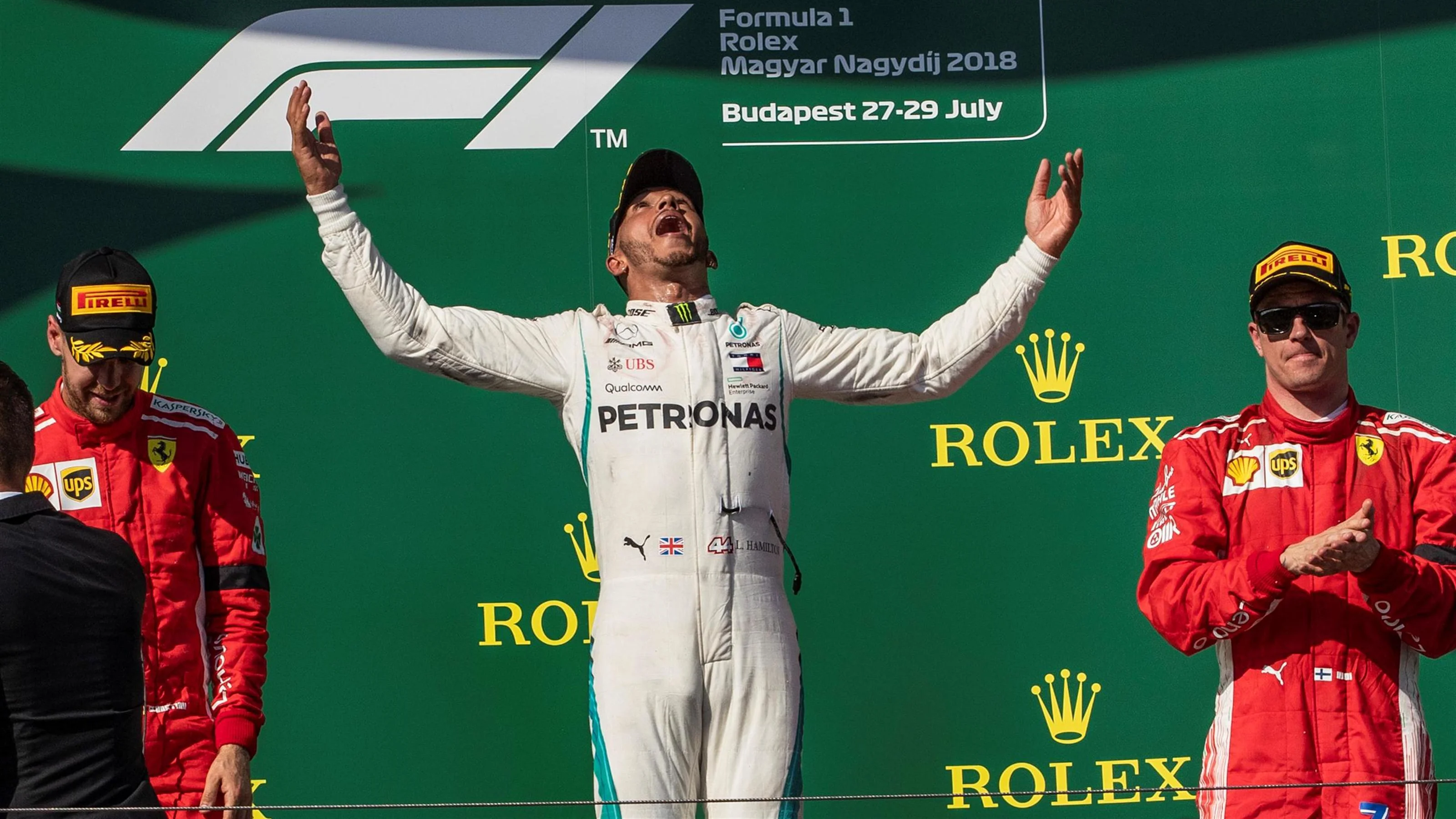 (L to R): Sebastian Vettel (GER) Ferrari, Lewis Hamilton (GBR) Mercedes-AMG F1 and Kimi Raikkonen
