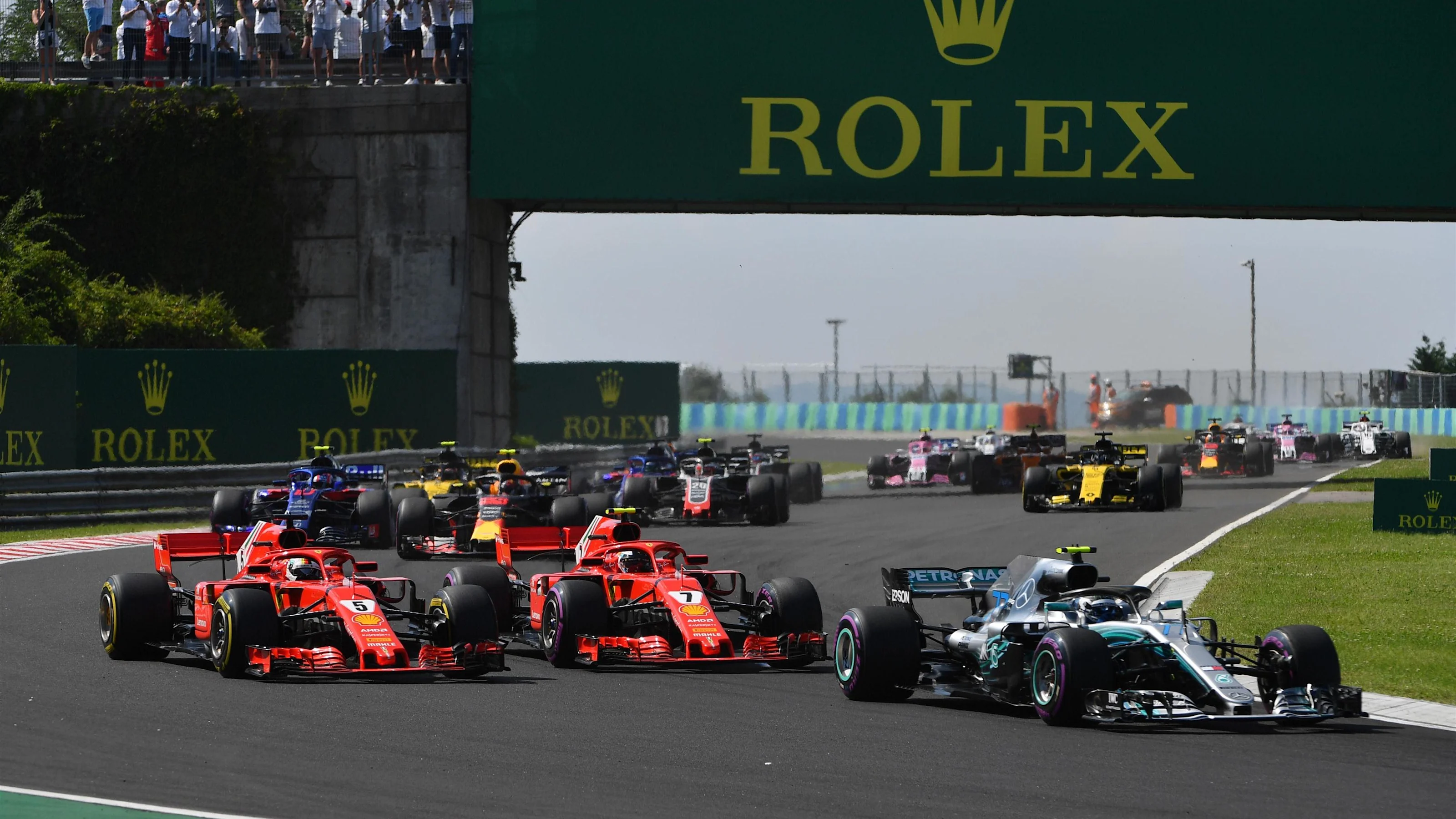 Valtteri Bottas (FIN) Mercedes-AMG F1 W09 EQ Power+, Sebastian Vettel (GER) Ferrari SF-71H and Kimi