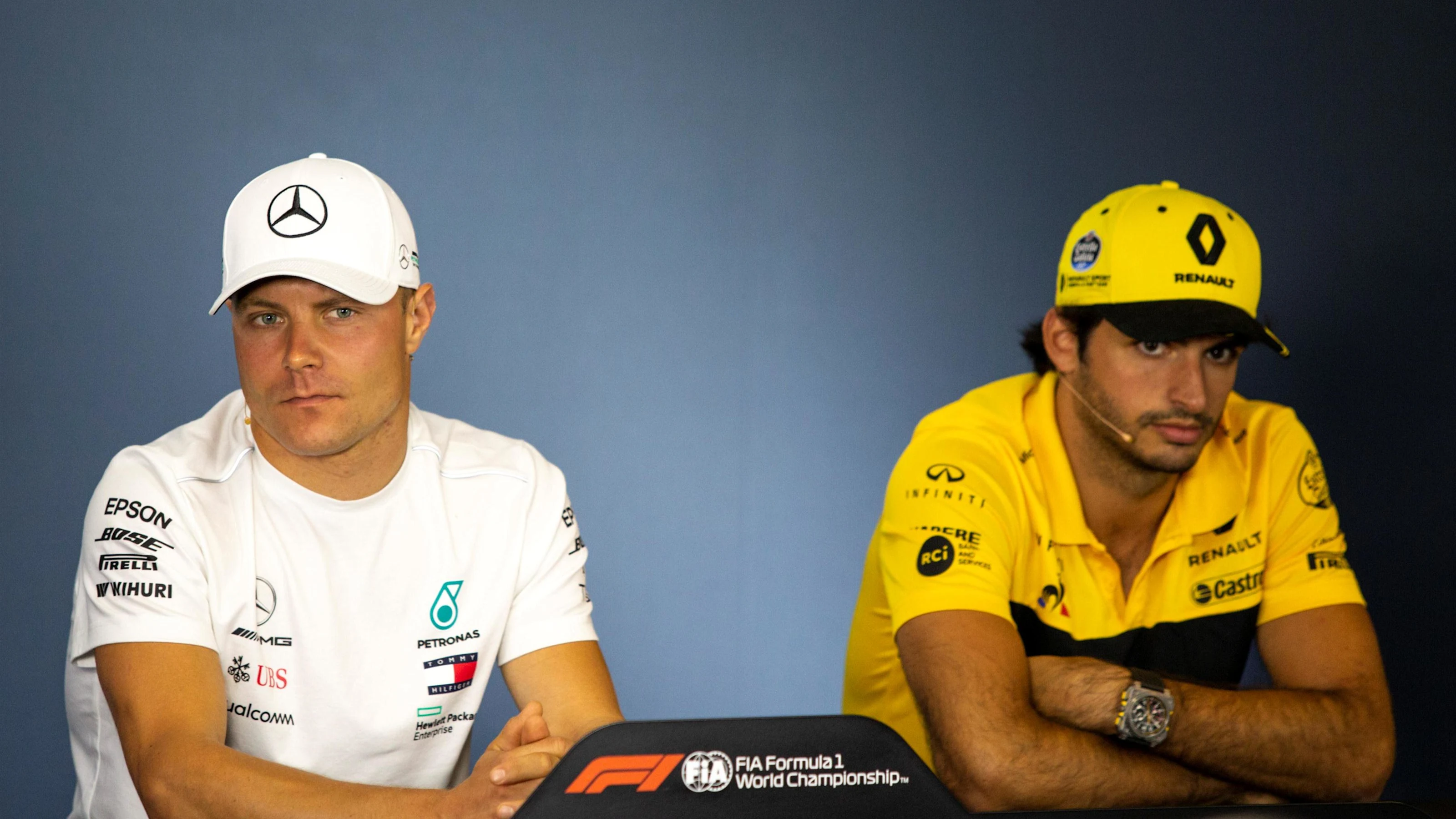 Valtteri Bottas (FIN) Mercedes-AMG F1 and Carlos Sainz jr (ESP) Renault Sport F1 Team in the Press