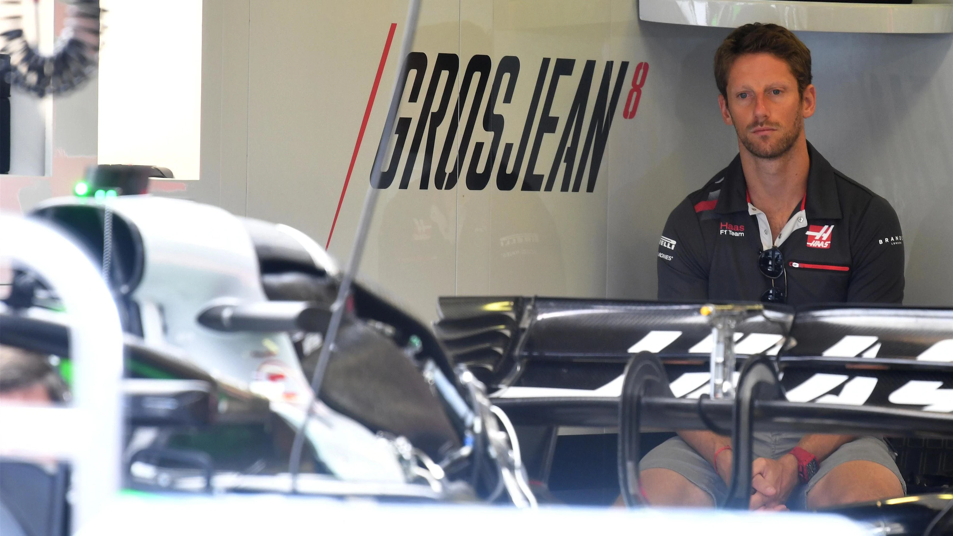 Romain Grosjean (FRA) Haas F1 in the garage at Formula One World Championship, Rd12, Hungarian