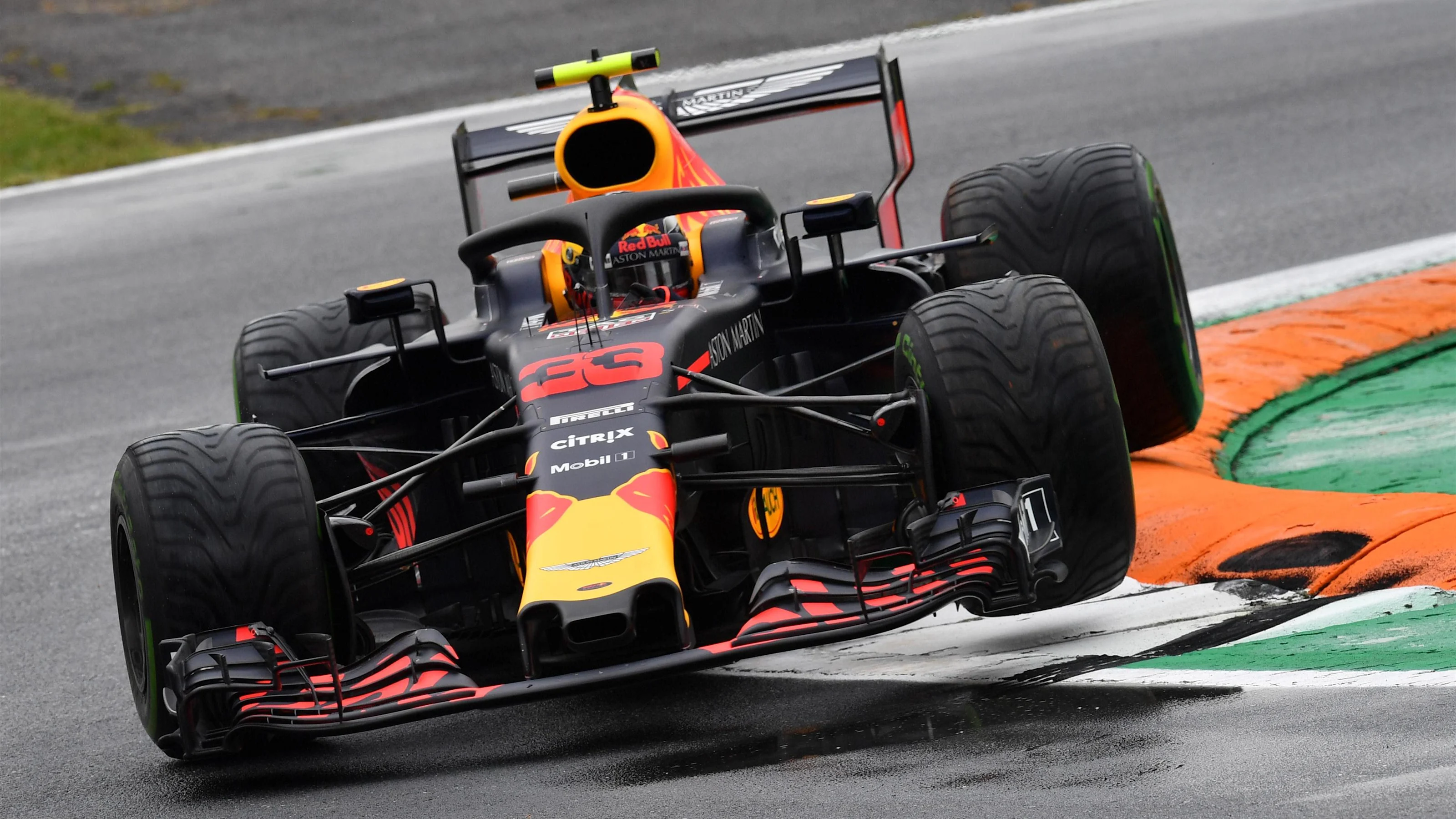 Max Verstappen, Red Bull Racing RB14 jumps over the kerb at Formula One World Championship, Rd14,
