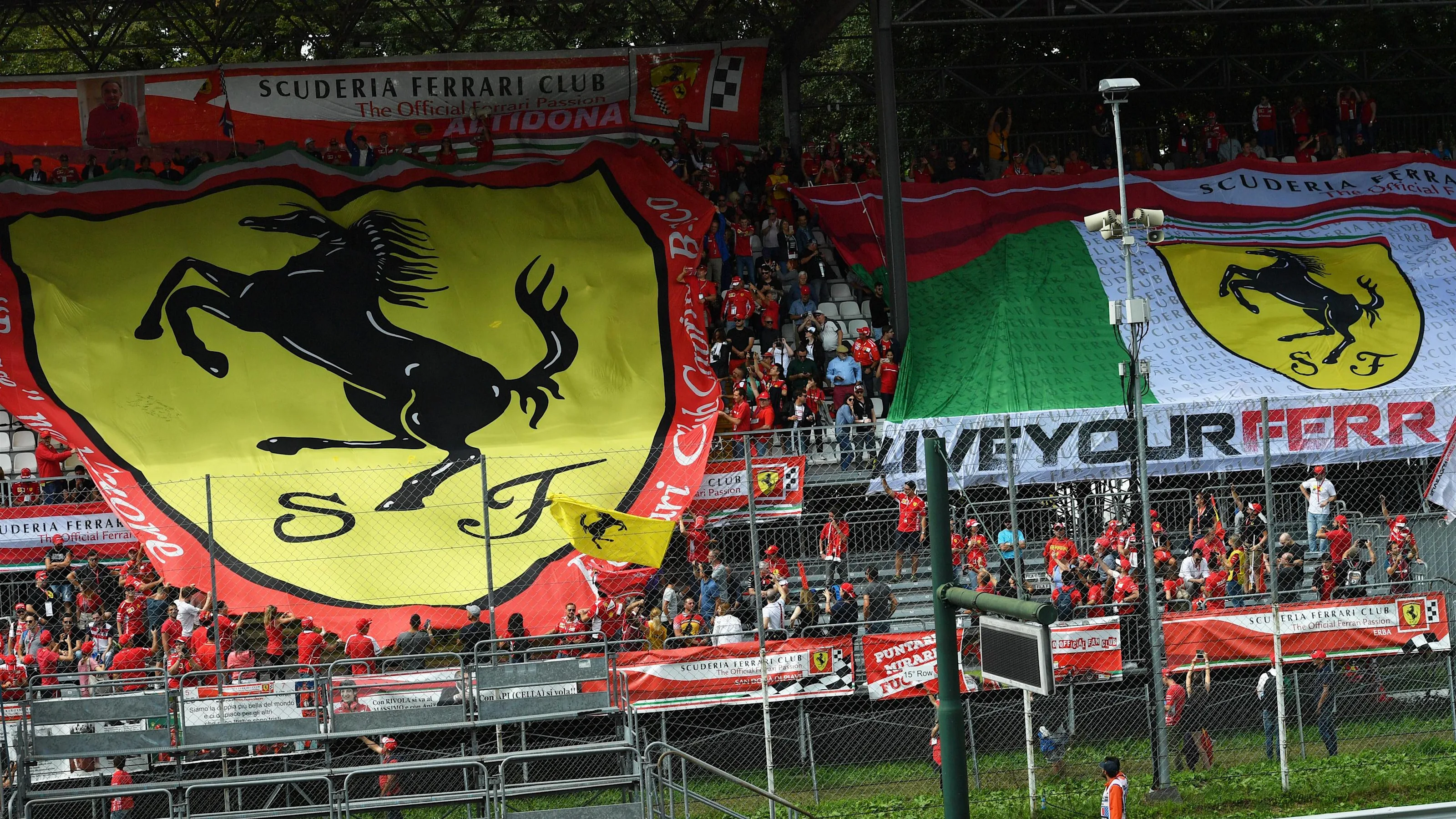 Ferrari fans and giant Ferrari flag at Formula One World Championship, Rd14, Italian Grand Prix,