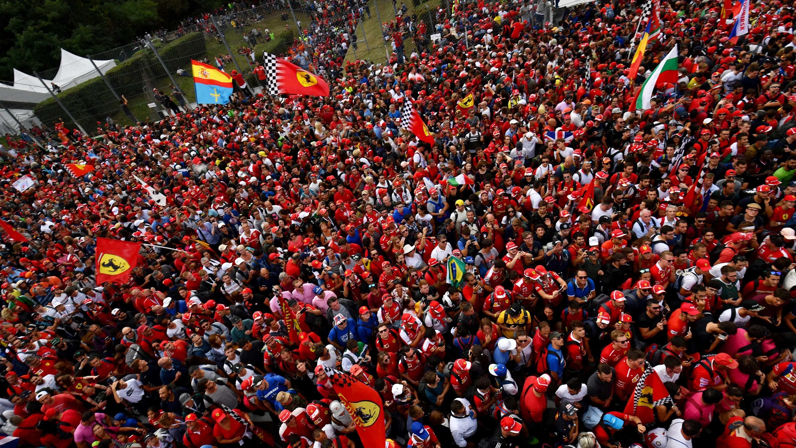 Fans celebrate on the track at Formula One World Championship, Rd14, Italian Grand Prix, Race,