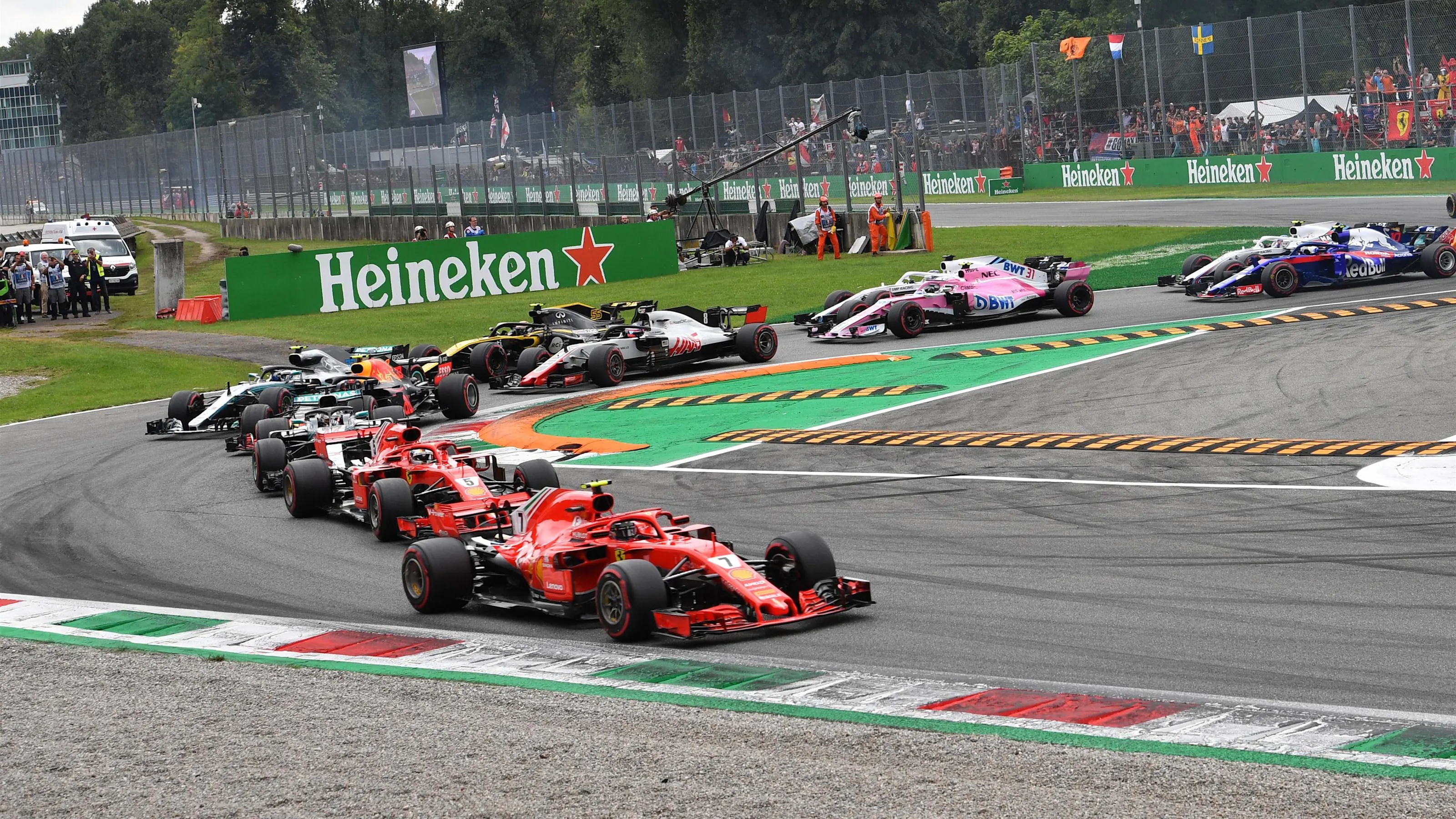 Kimi Raikkonen, Ferrari SF71H, Sebastian Vettel, Ferrari SF71H and Lewis Hamilton, Mercedes AMG F1