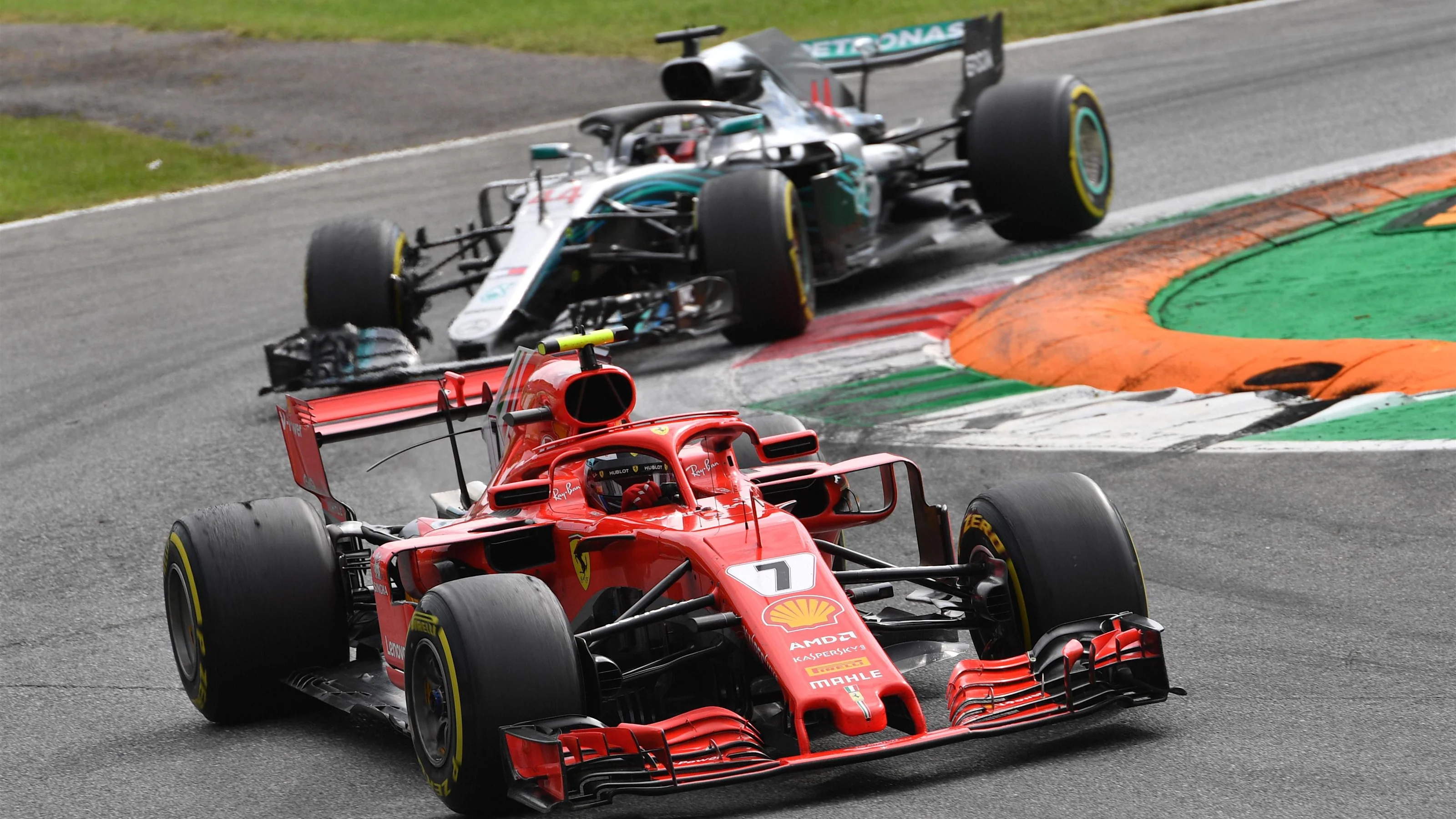 Kimi Raikkonen, Ferrari SF71H leads Lewis Hamilton, Mercedes AMG F1 W09 at Formula One World
