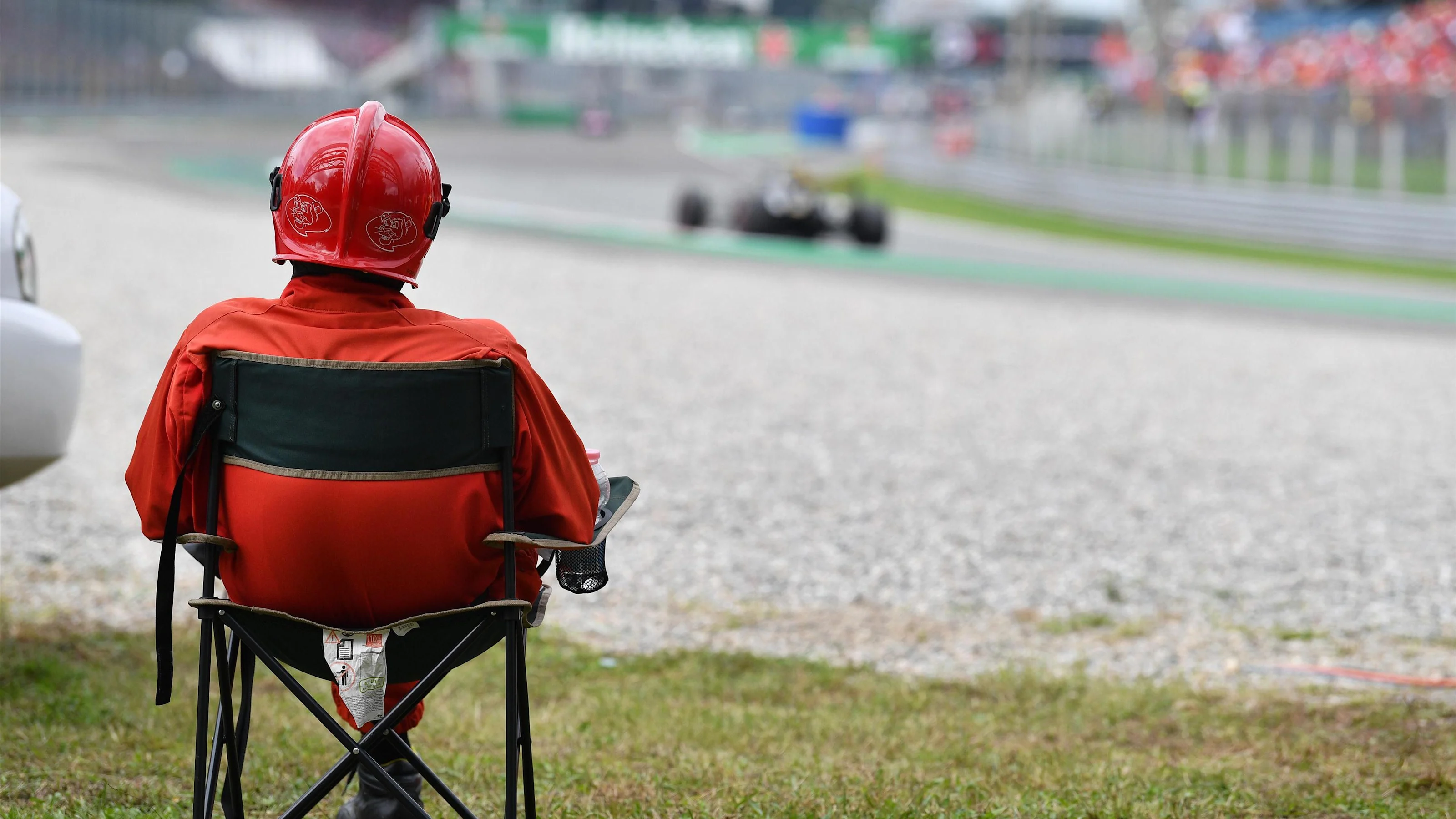 Marshal watches the action at Formula One World Championship, Rd14, Italian Grand Prix, Race,